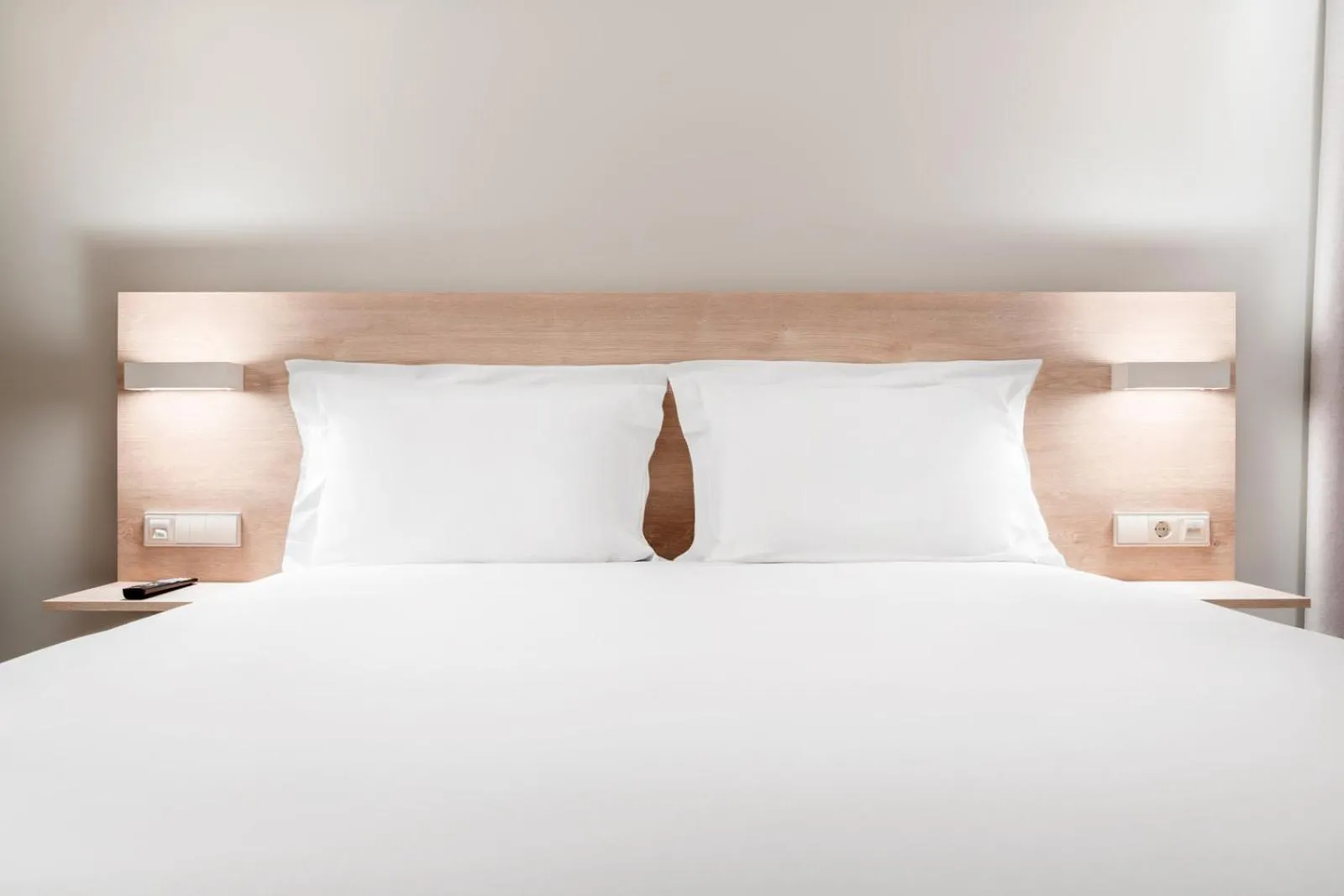 Bed in Moov Hotel Lisboa Oriente