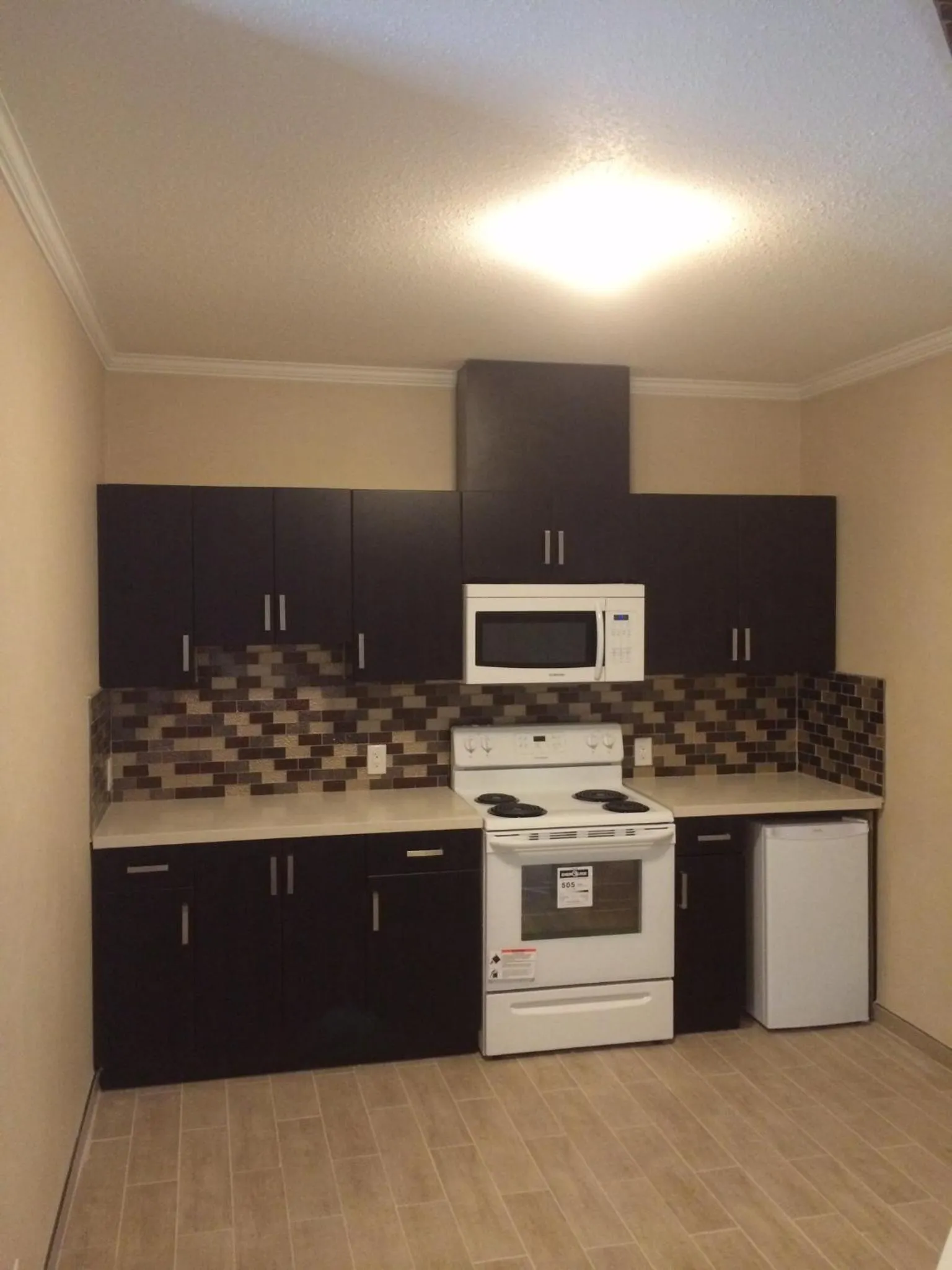 Kitchen or kitchenette in Super 8 by Wyndham Watrous