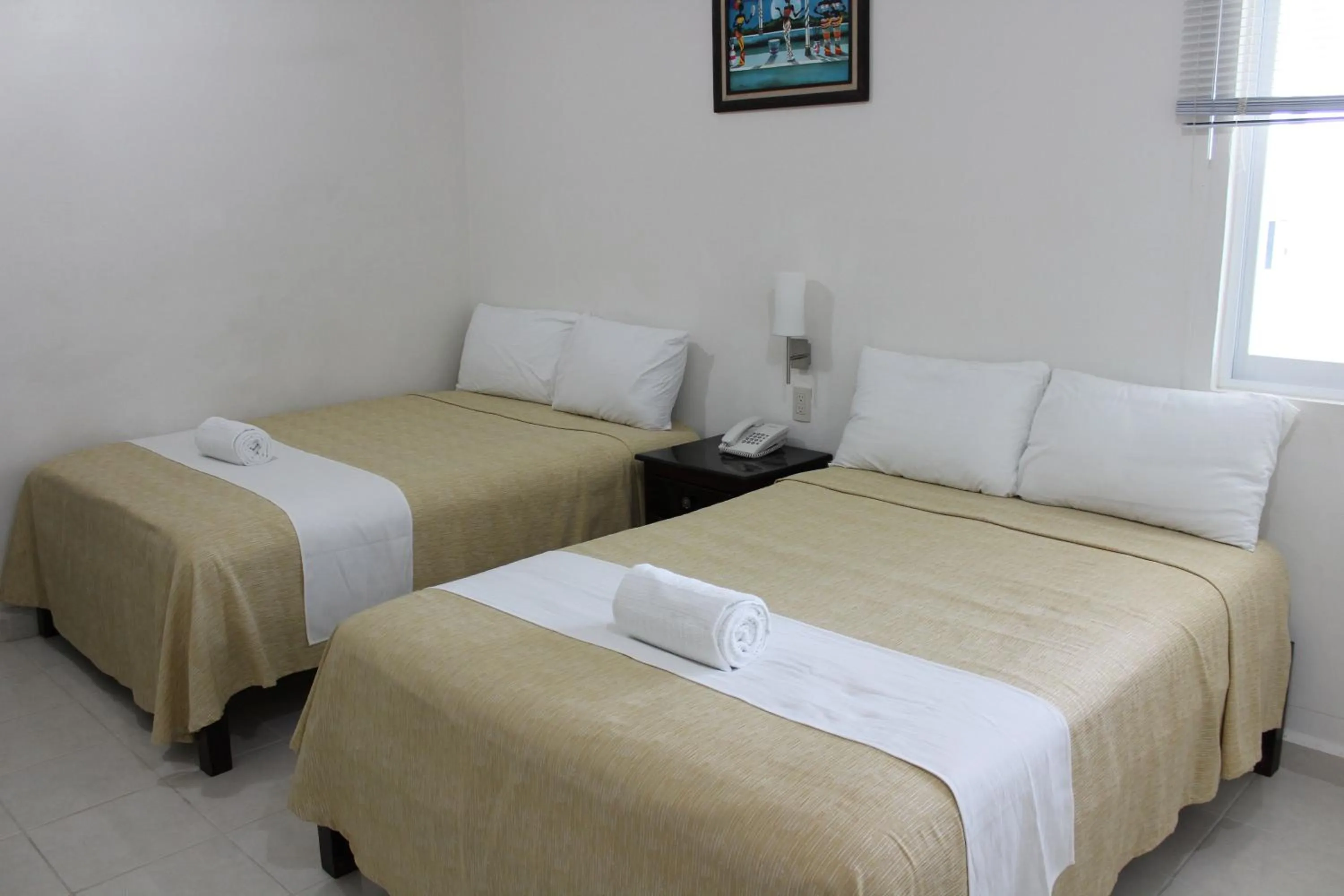 Bed in Hotel Malecón