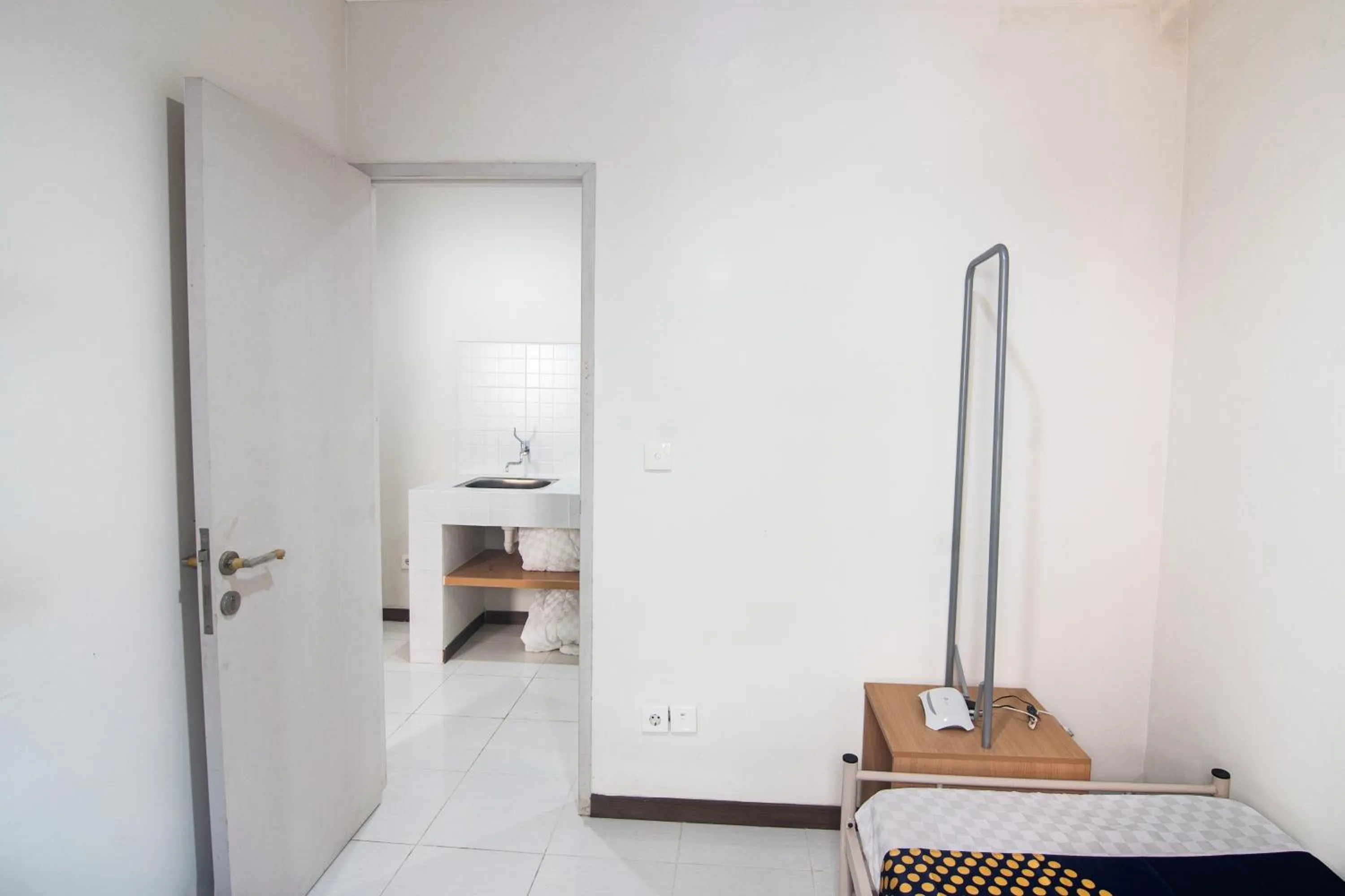 Bedroom in Hotel O Anartha Residence