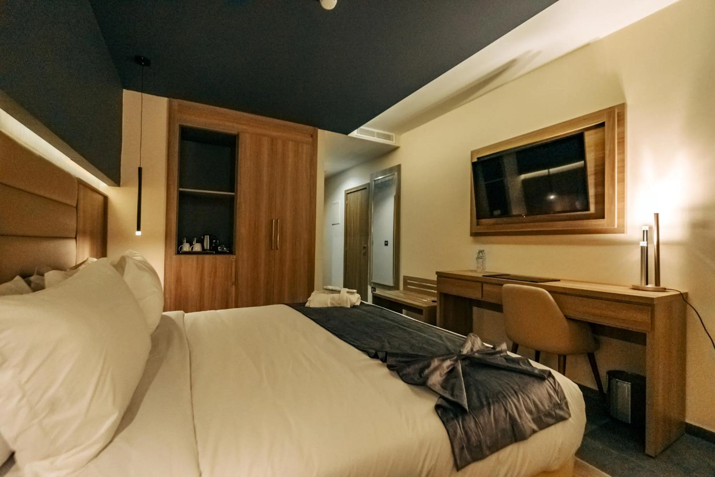 Bed in AD HOTEL HYDRA