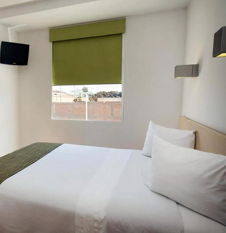 Photo of the whole room, Bed in One Aguascalientes San Marcos