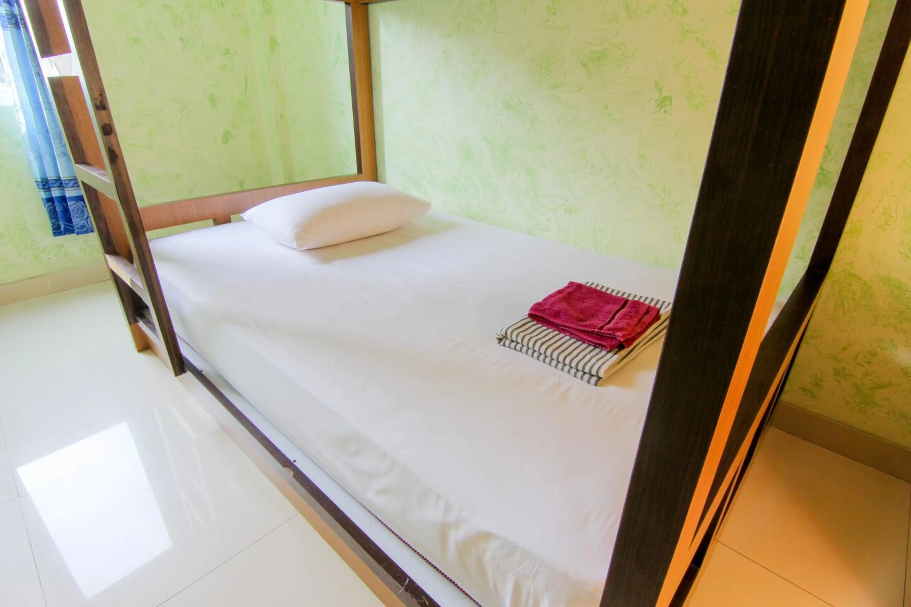 Bed in Yani Homestay