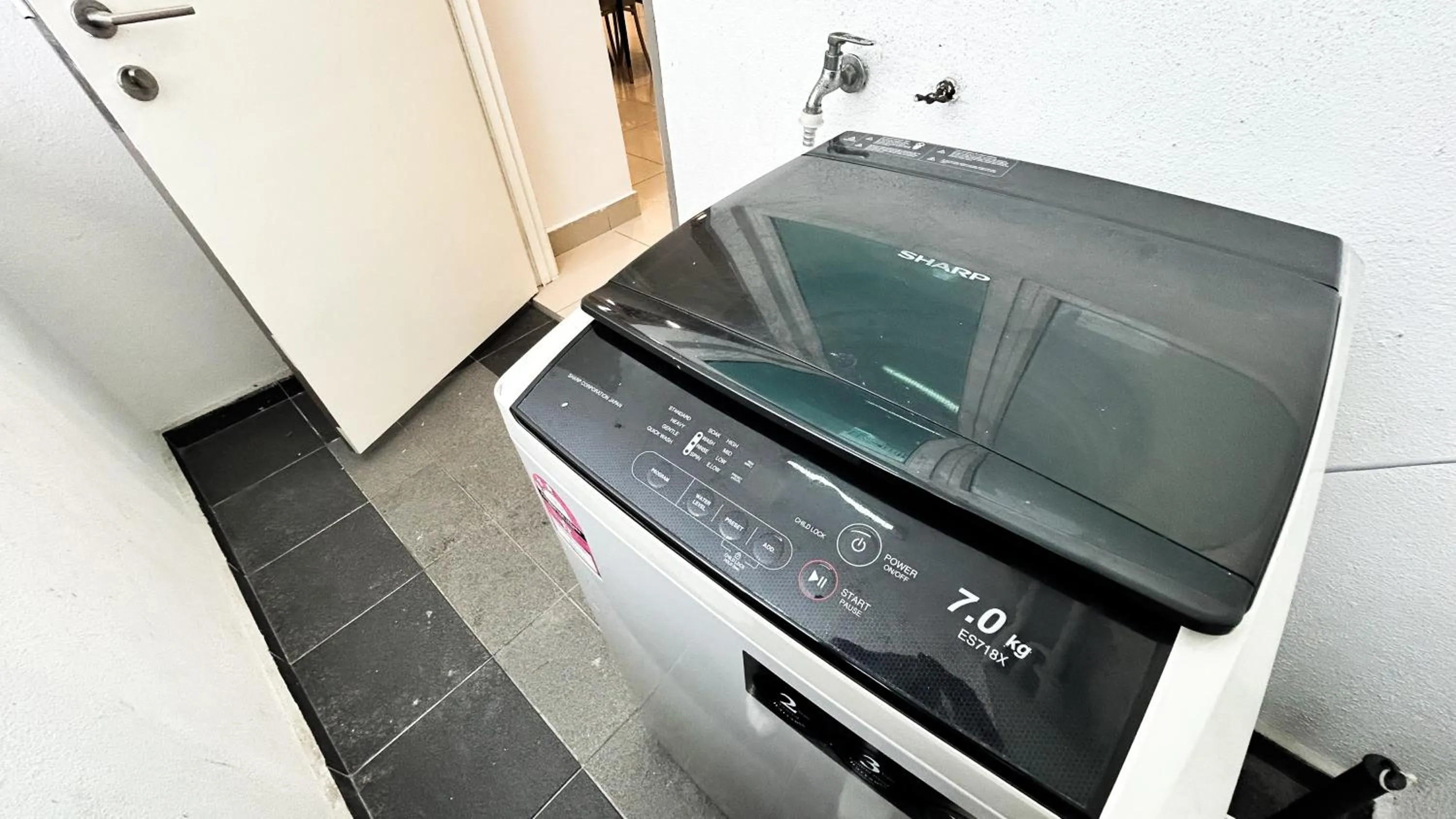 washing machine in Setapak Central Signature Suites by Manhattan Group