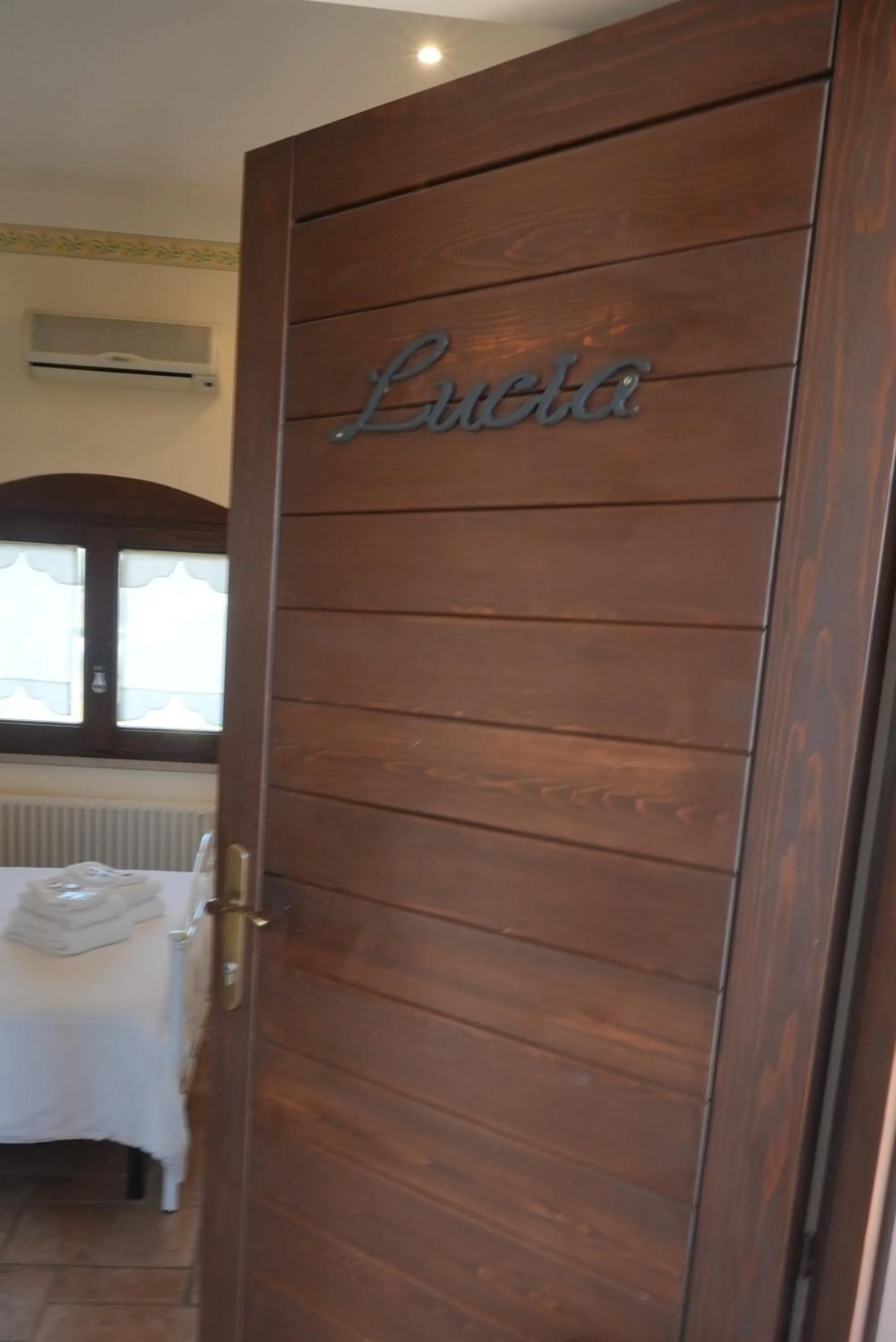 Bed in B&B Donna Luisa