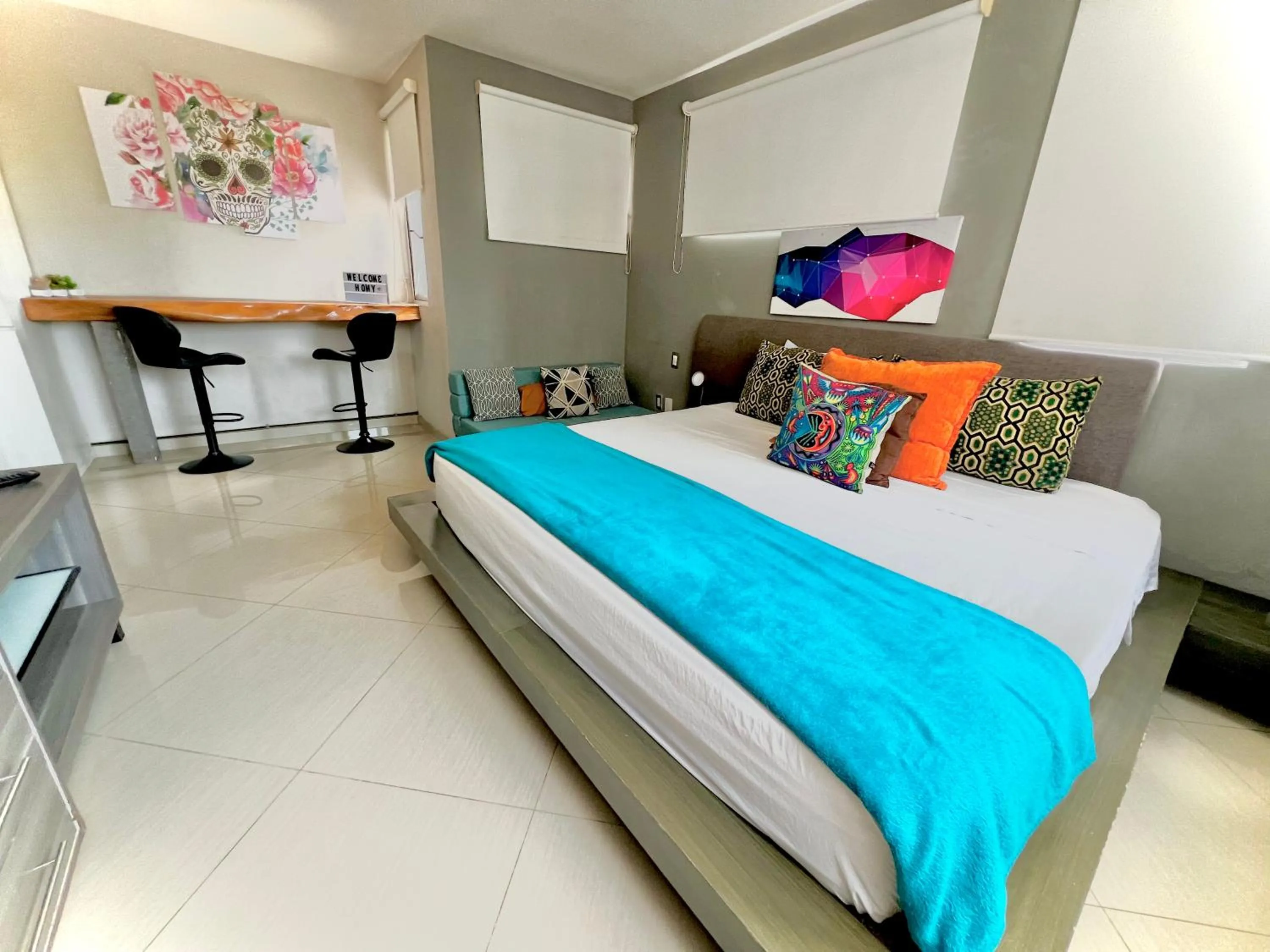 Bed in Playa Centro Rooftop Apartments & Studios