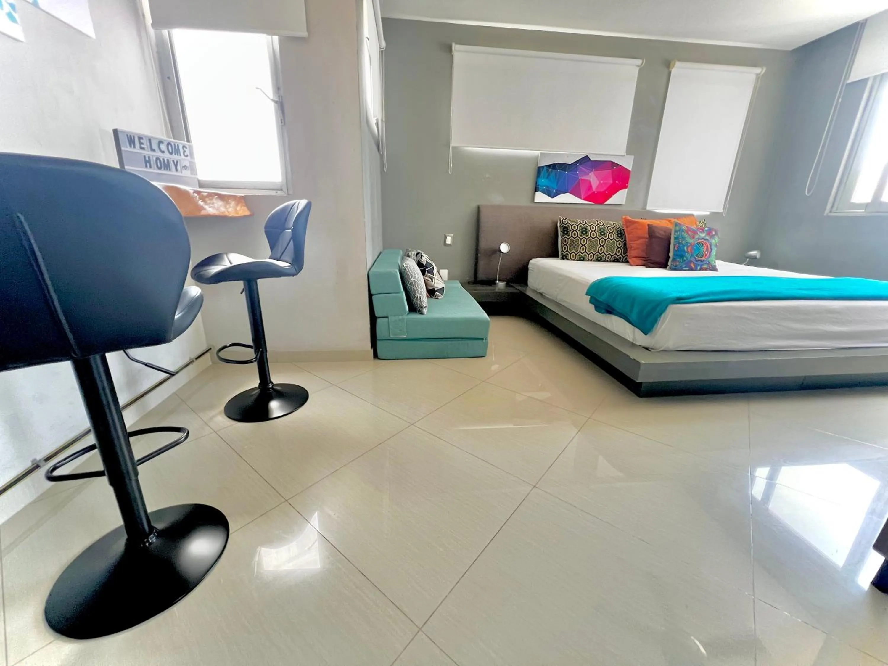 Bed in Playa Centro Rooftop Apartments & Studios