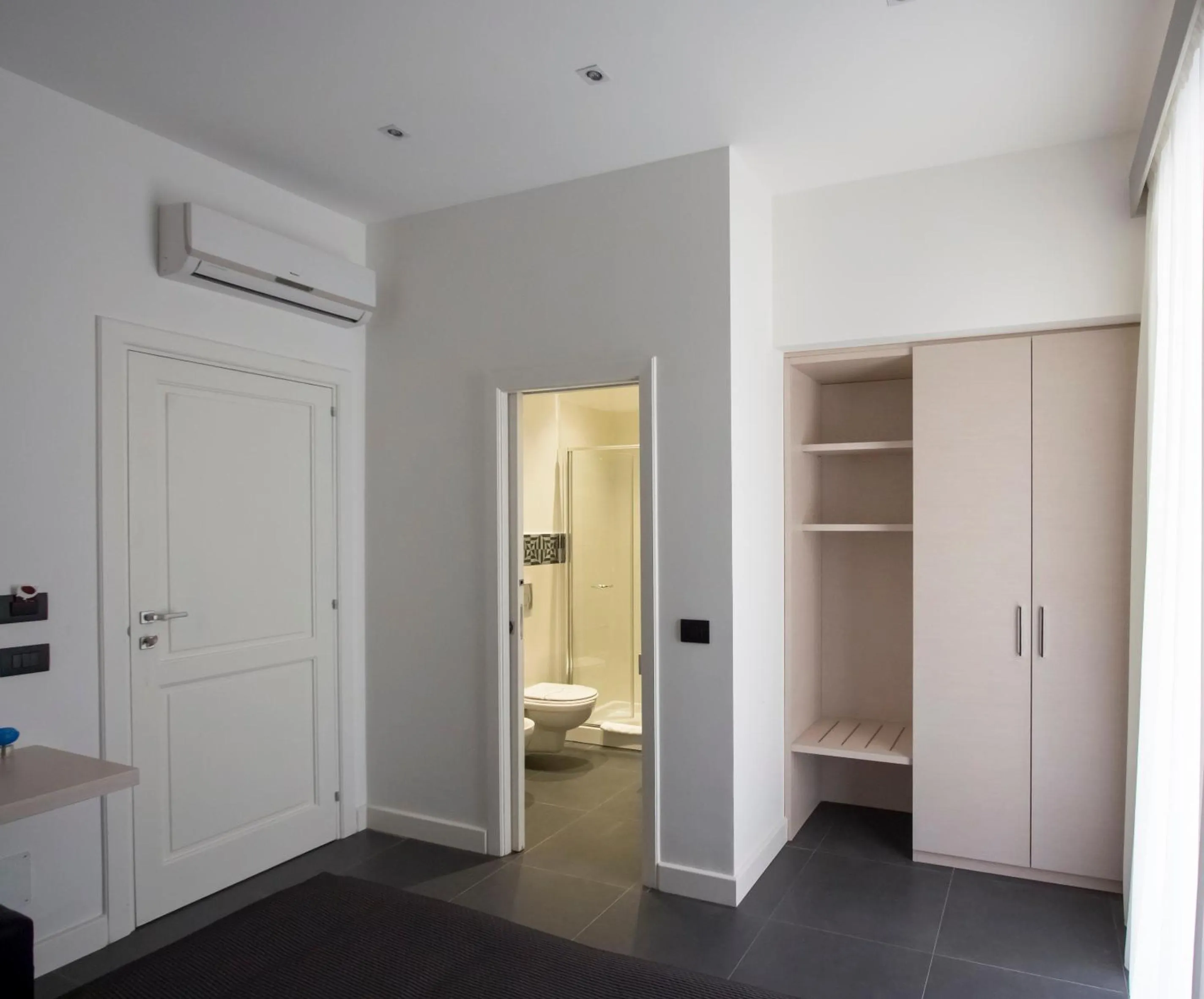 Toilet in Nostos rooms & Apartments