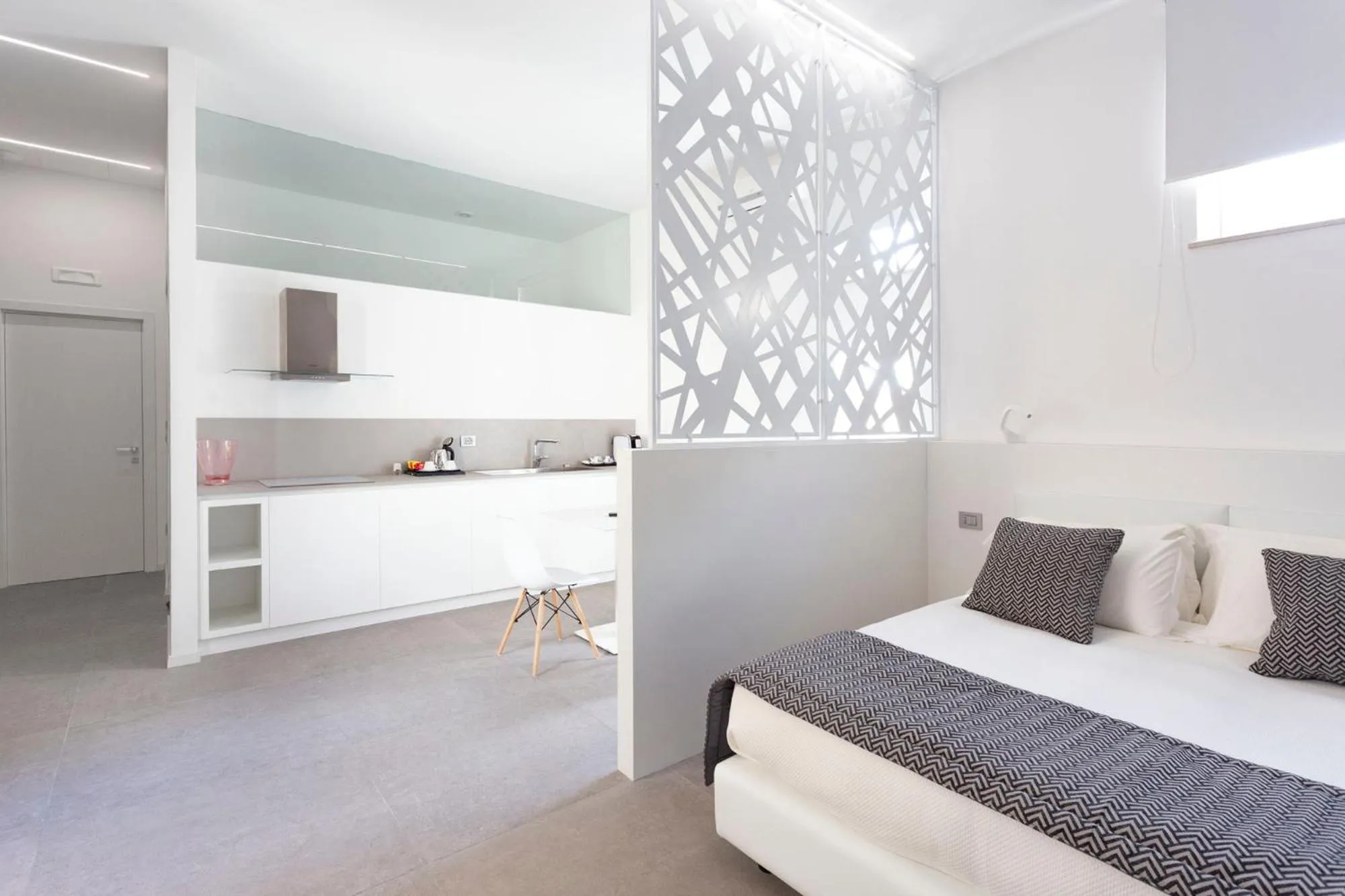 Living room, Bed in Nostos rooms & Apartments