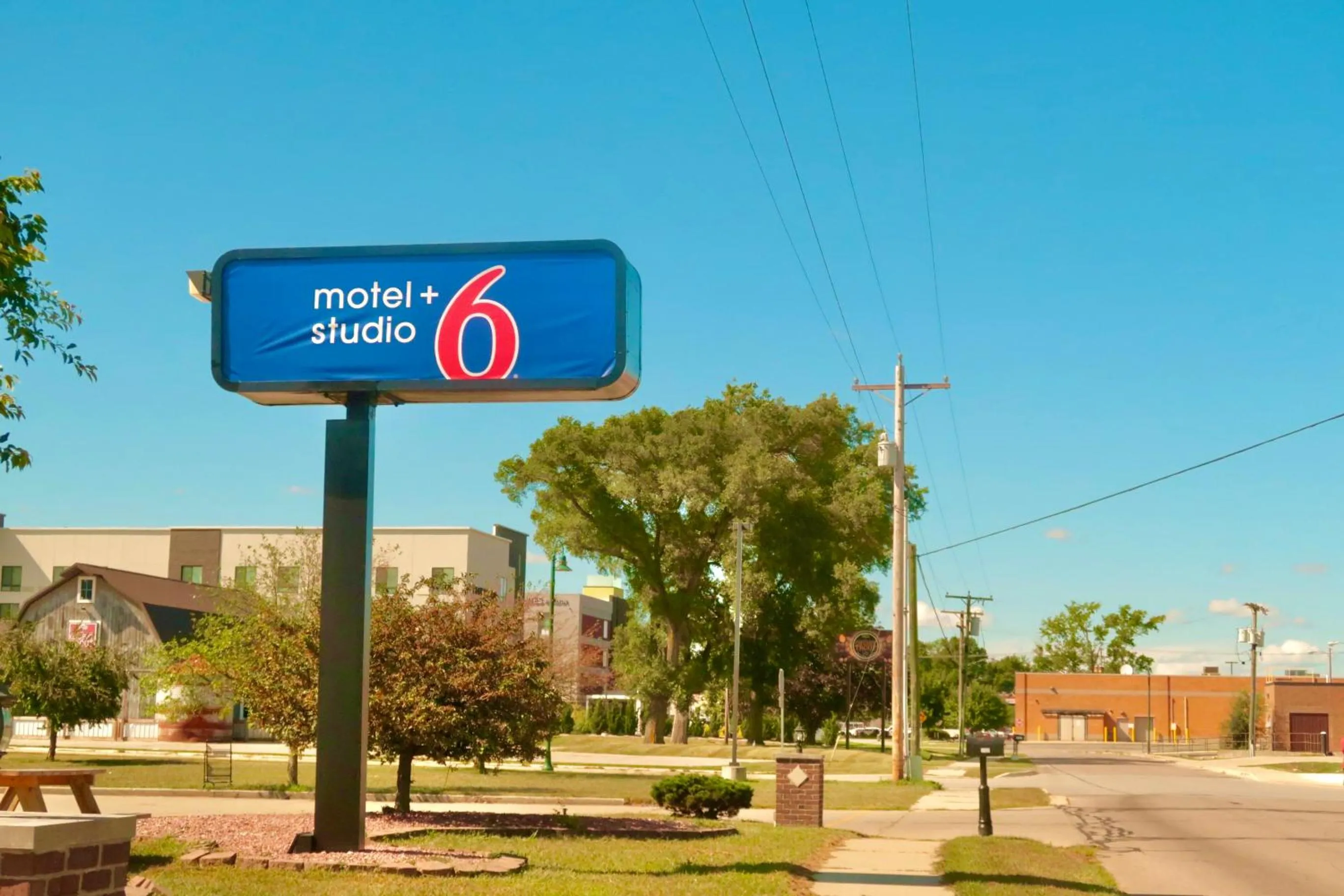 Property logo or sign in Studio 6 Elkhart, IN- Kitchenette Rooms