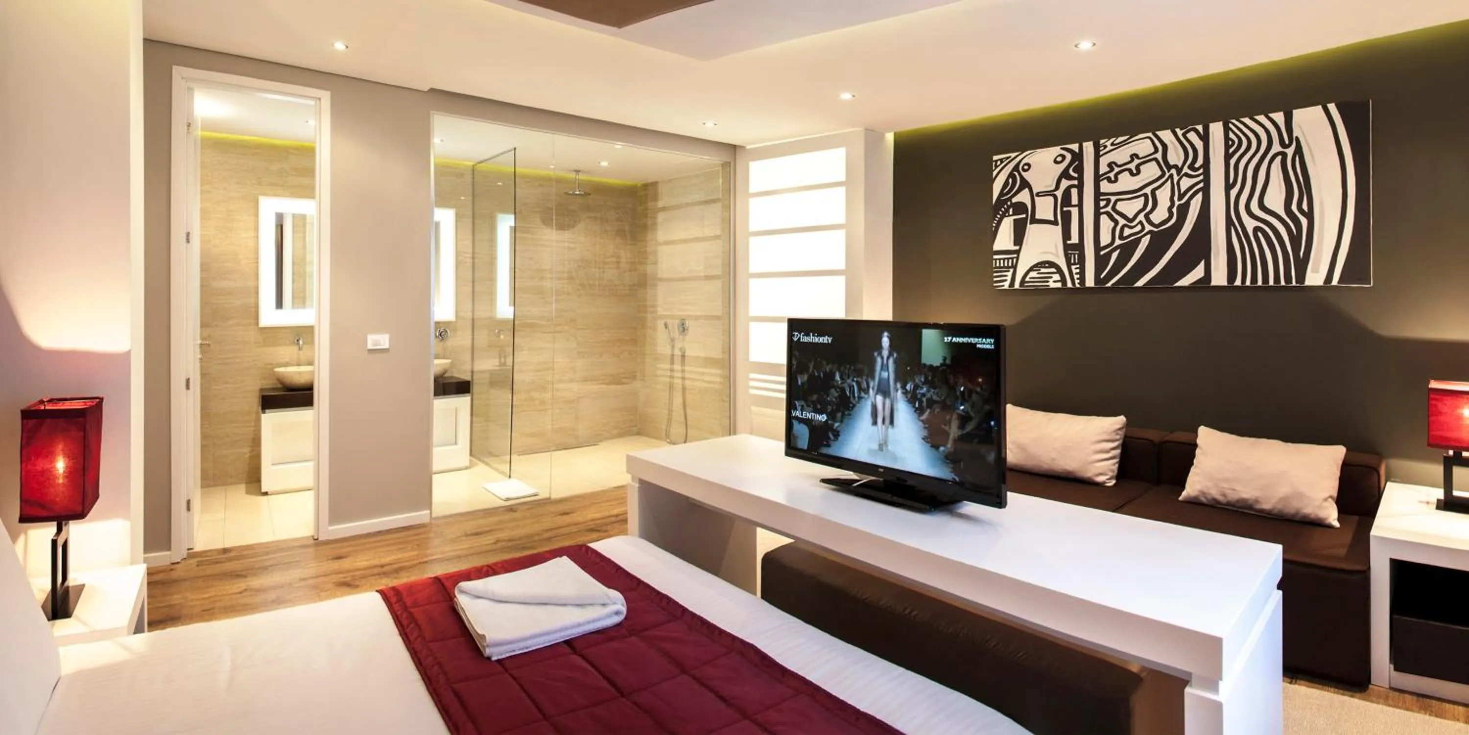 Bed in Eden Garden Suites