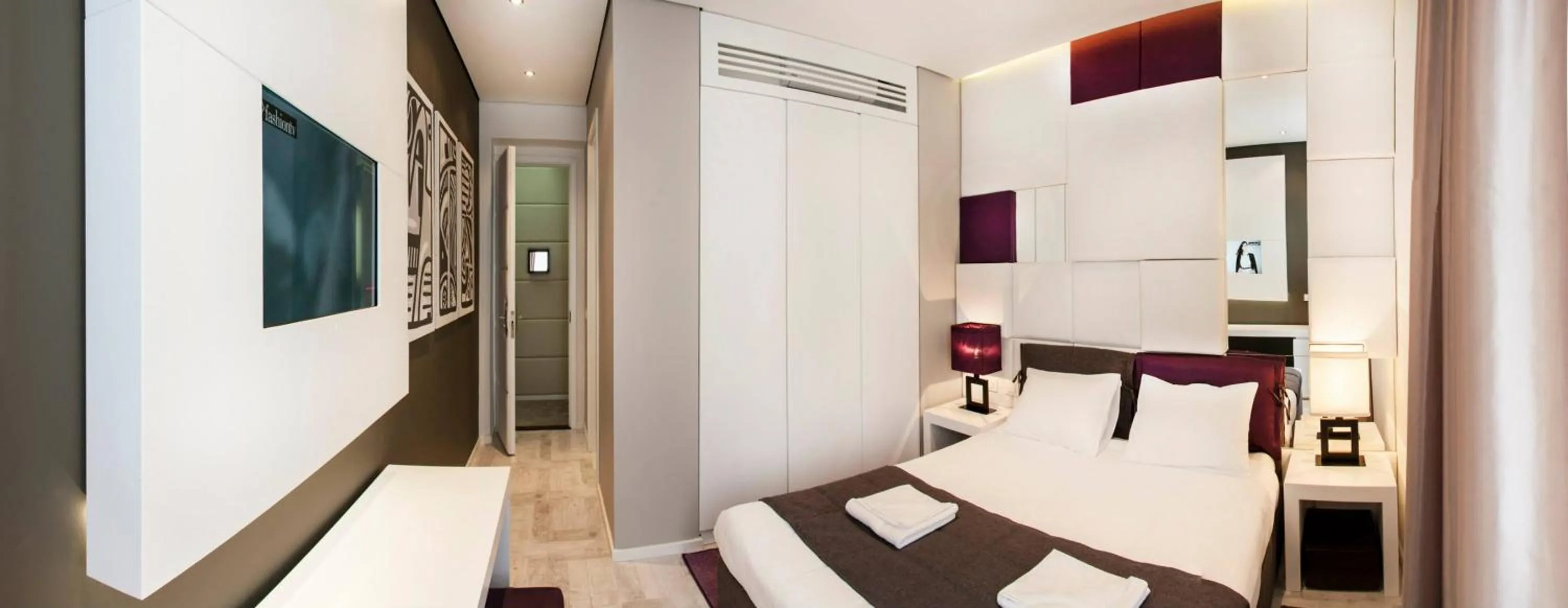 Bed in Eden Garden Suites