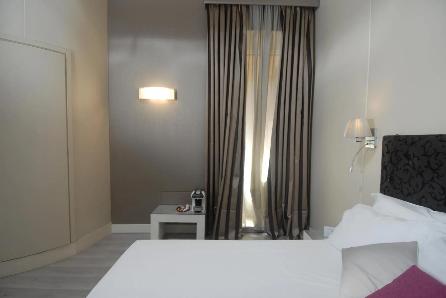 Bed in Piccolo di Piazza di Spagna Suites