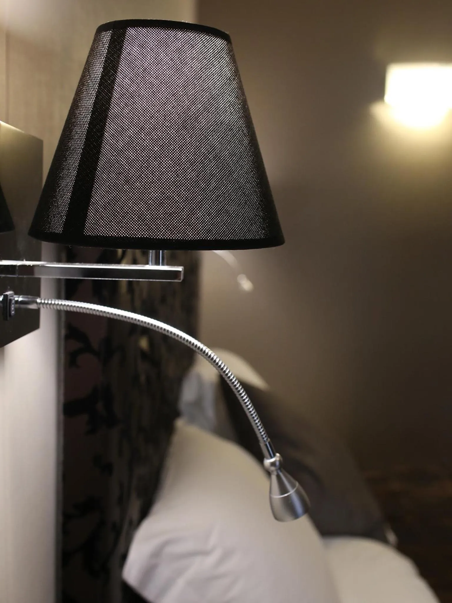 Decorative detail, Bed in Piccolo di Piazza di Spagna Suites