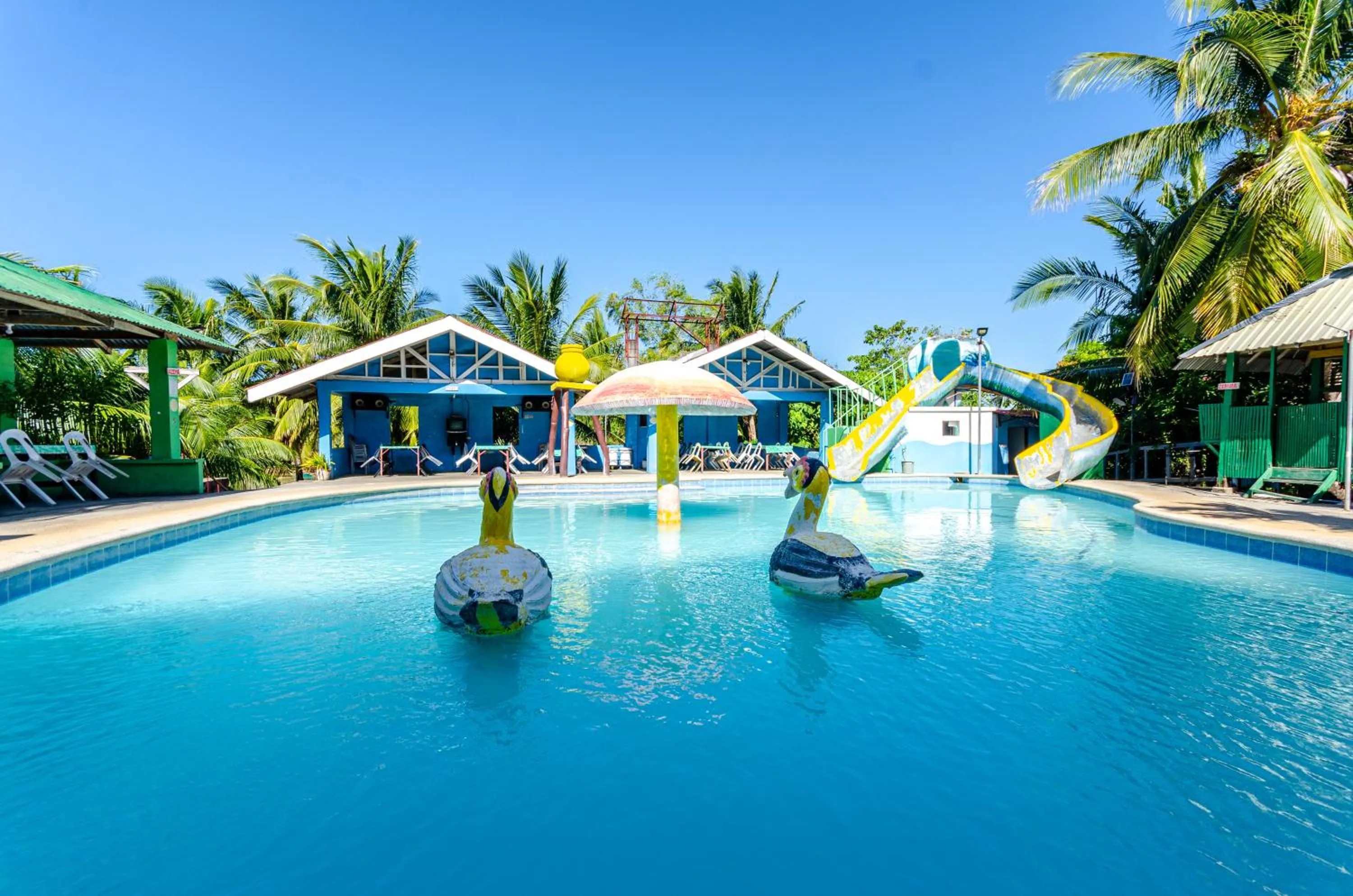 Swimming pool in Magsaysay Hillside Resort powered by Cocotel