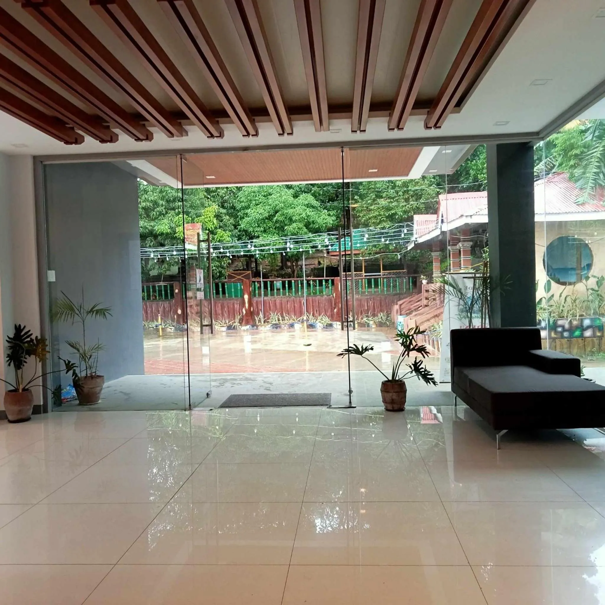 Lobby or reception in Magsaysay Hillside Resort powered by Cocotel