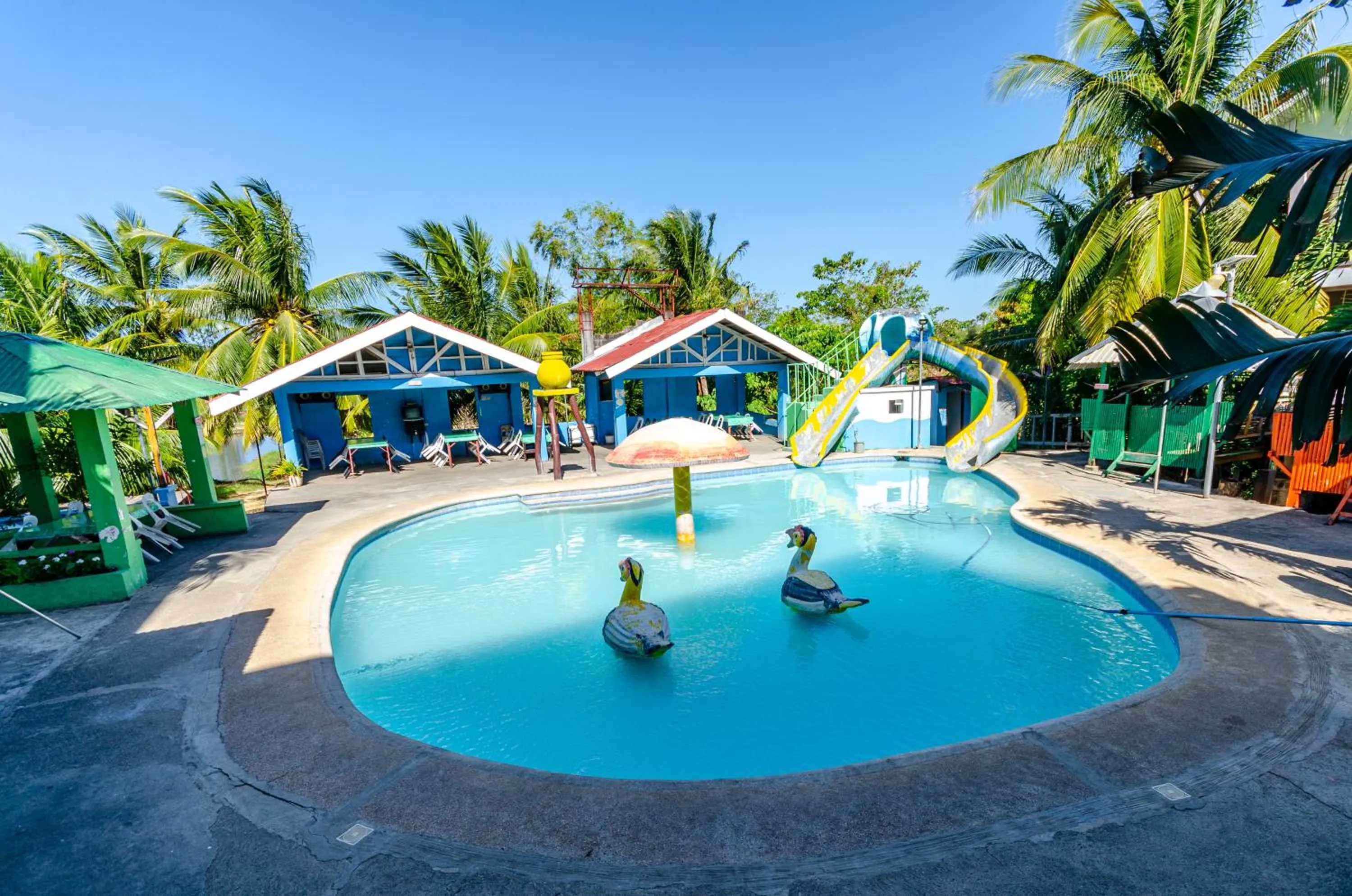 Swimming pool in Magsaysay Hillside Resort powered by Cocotel
