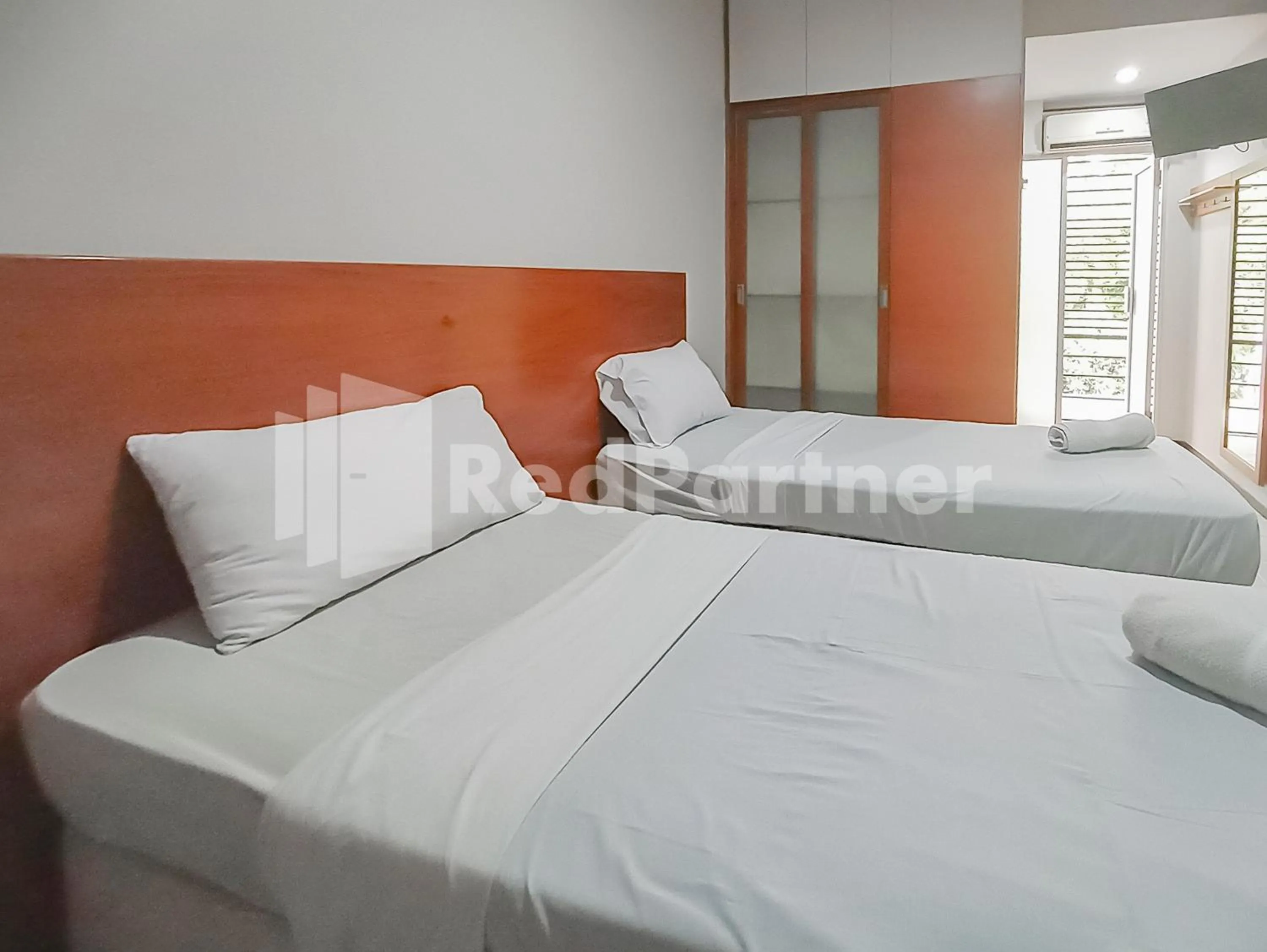 Bedroom in Sang Surya GuestHouse Syariah Near RS Hasan Sadikin Mitra RedDoorz