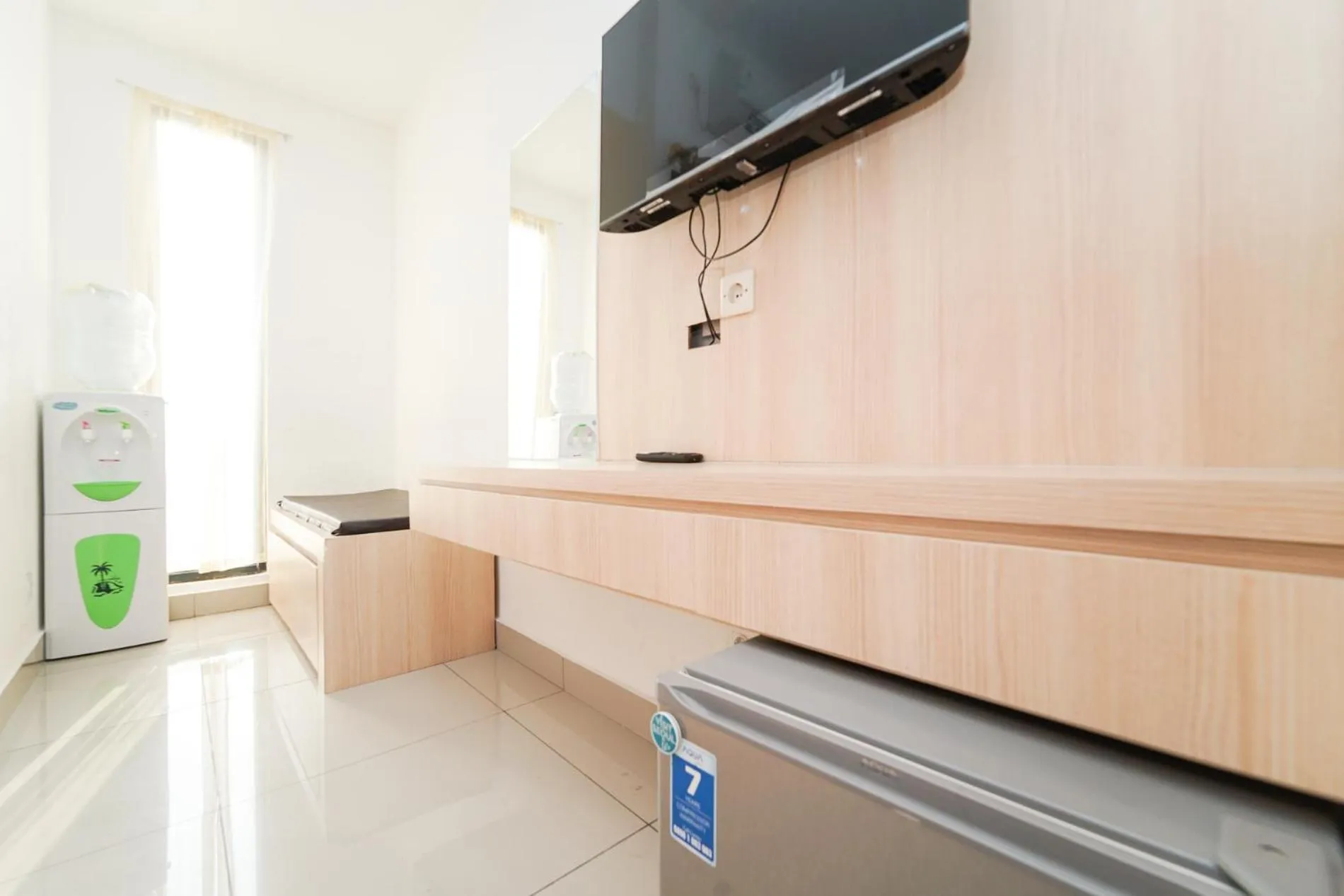 TV and multimedia in RedLiving Apartemen Sayana - Premium Property