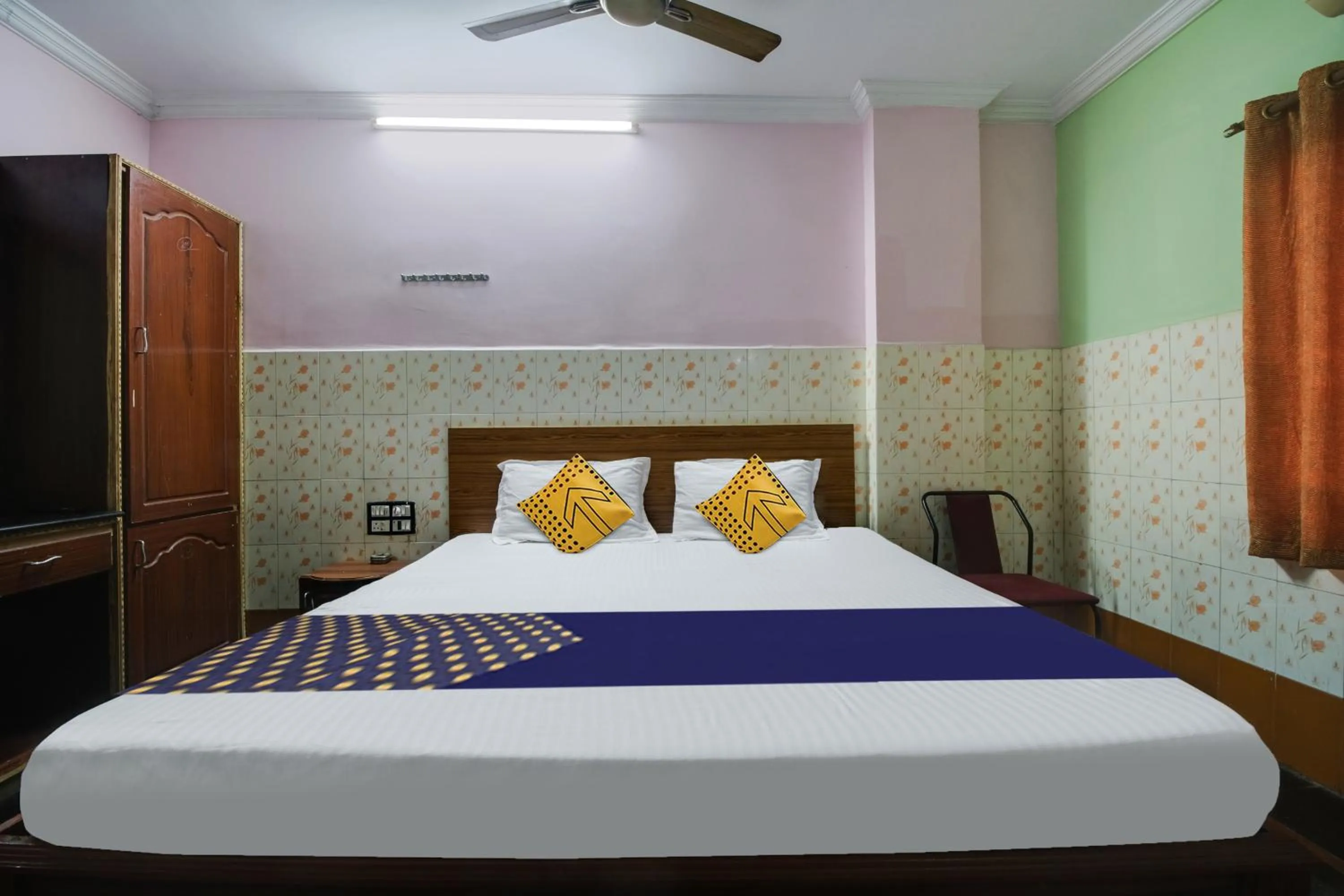 Bedroom in Hotel O Sir Vr Sairam Lodge
