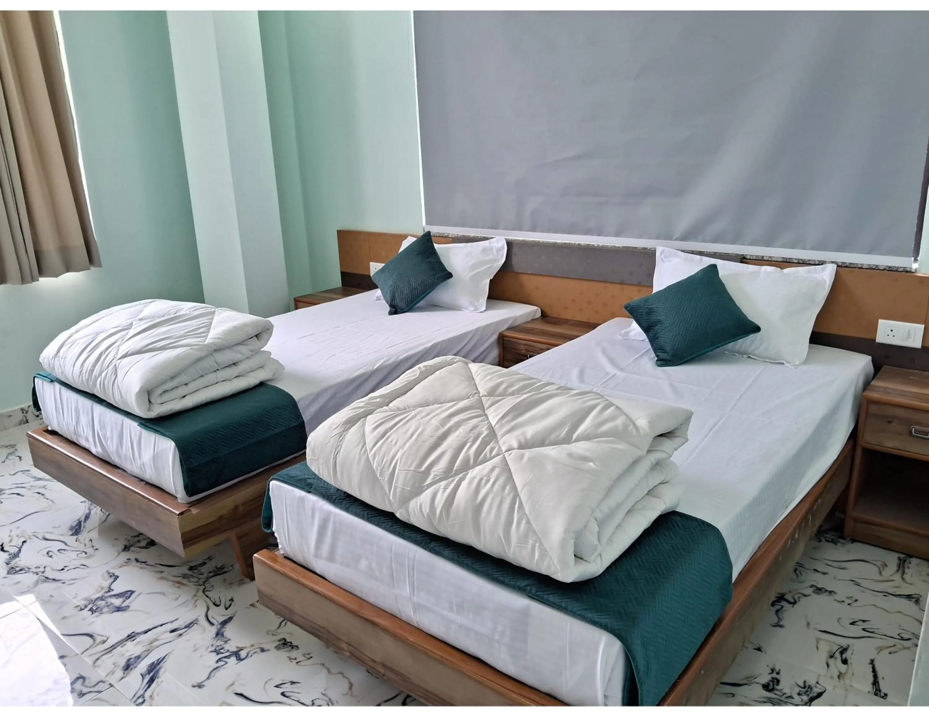 Bed in Hotel Gridhakuta International