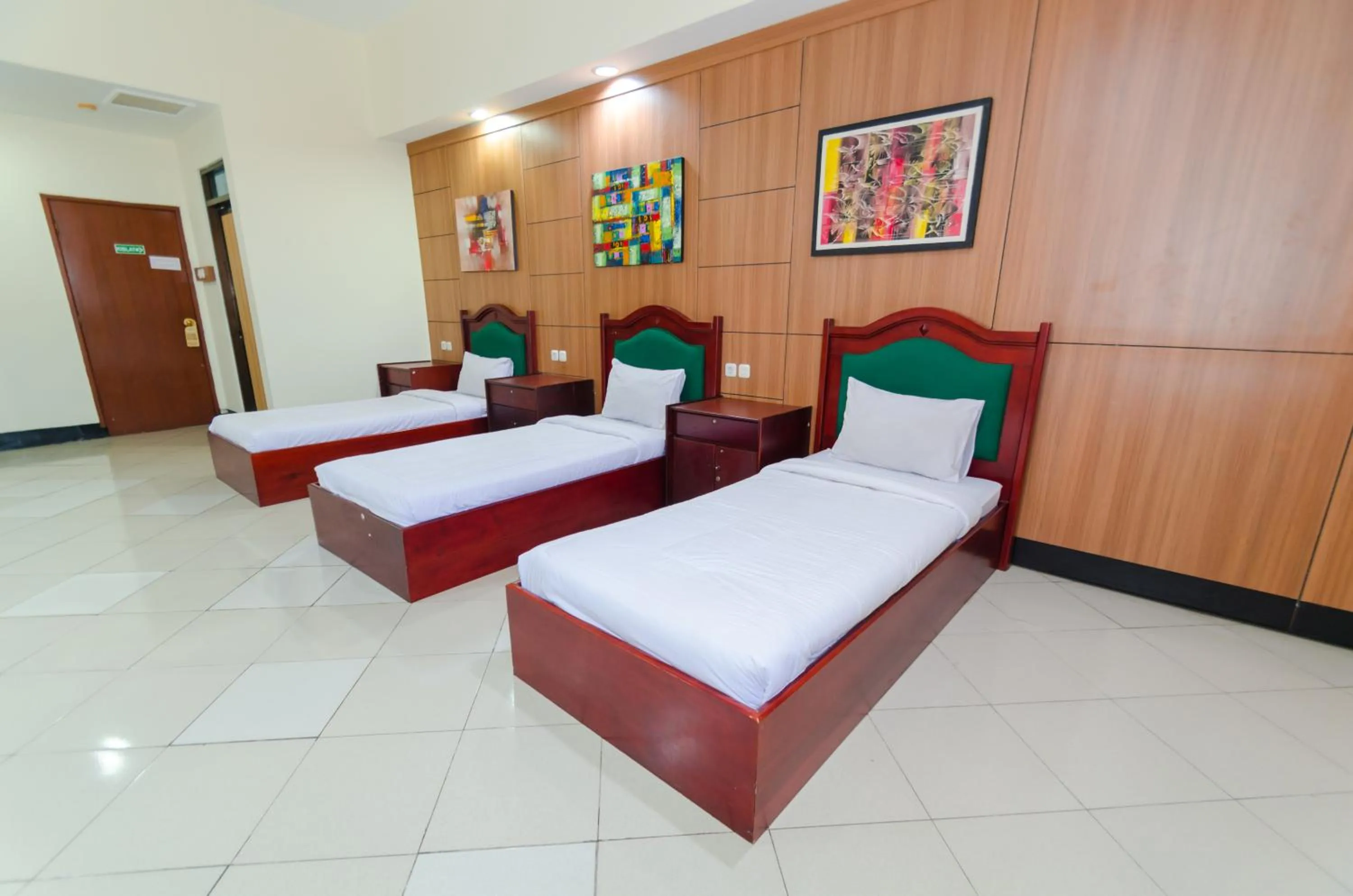 Bed in Graha Widya Bhakti at STIESIA Surabaya