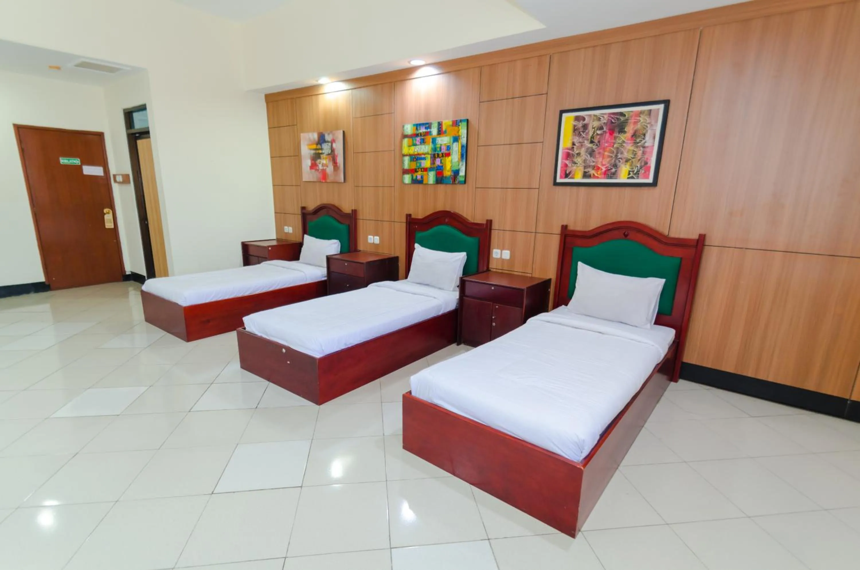 Bed in Graha Widya Bhakti at STIESIA Surabaya