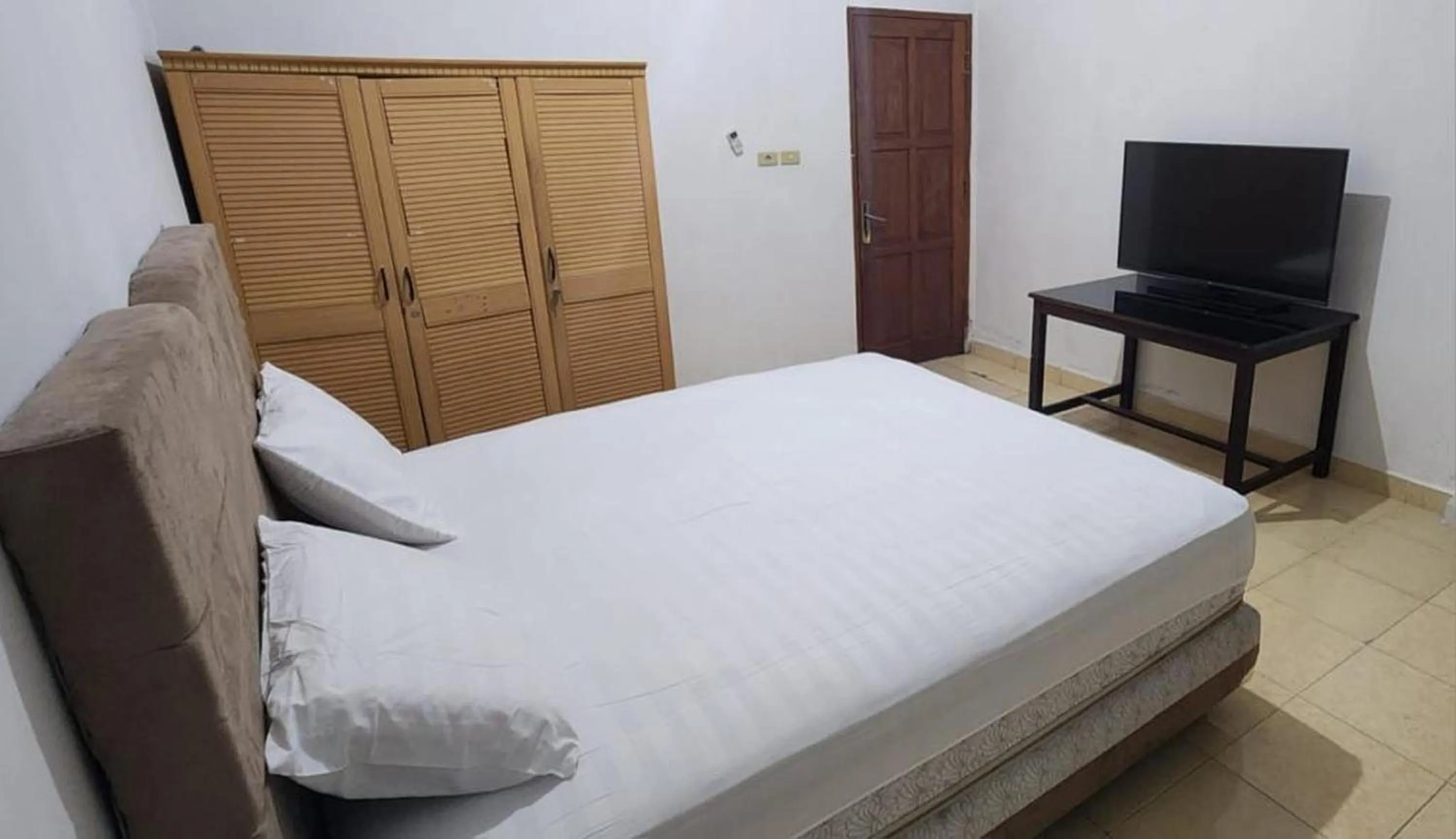 Bedroom, Bed in Permata Homestay Kotamobagu Mitra RedDoorz