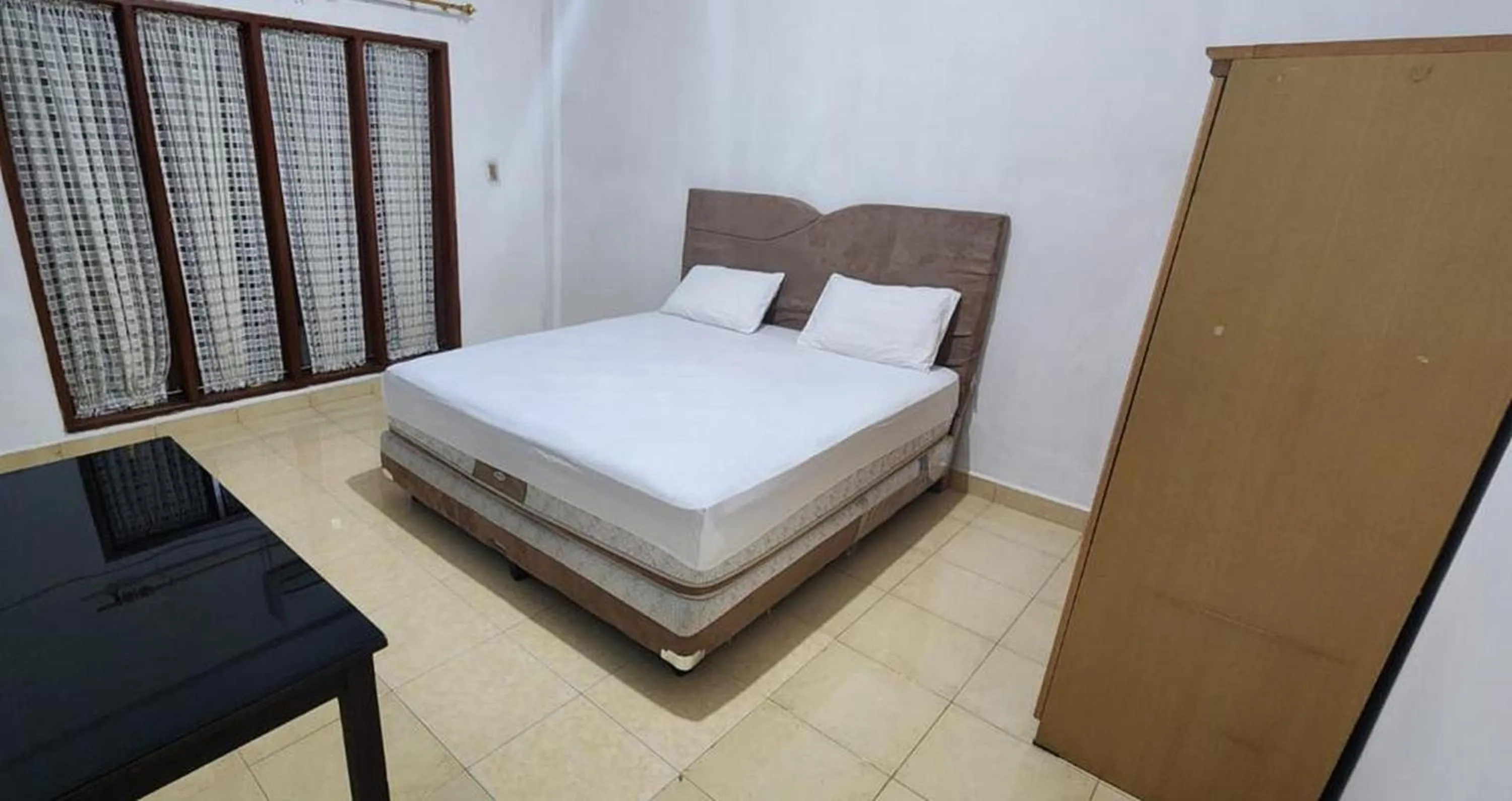 Bedroom, Bed in Permata Homestay Kotamobagu Mitra RedDoorz