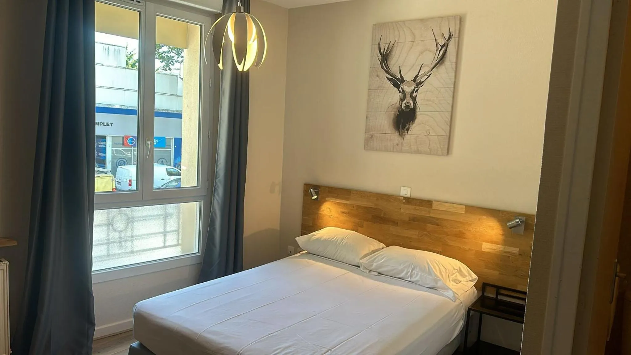 Bed in HOTEL IN PARIS