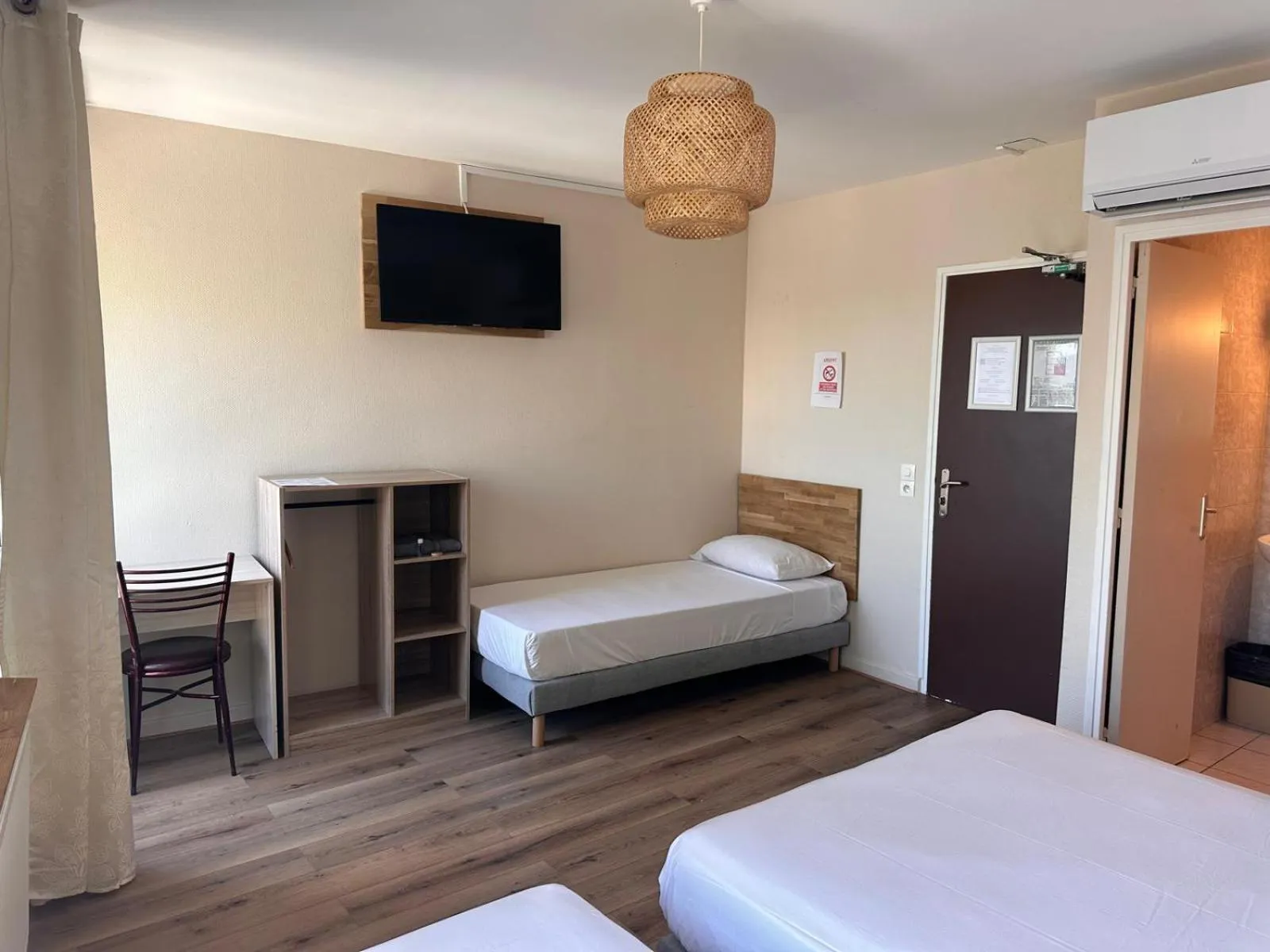 Bed in HOTEL IN PARIS