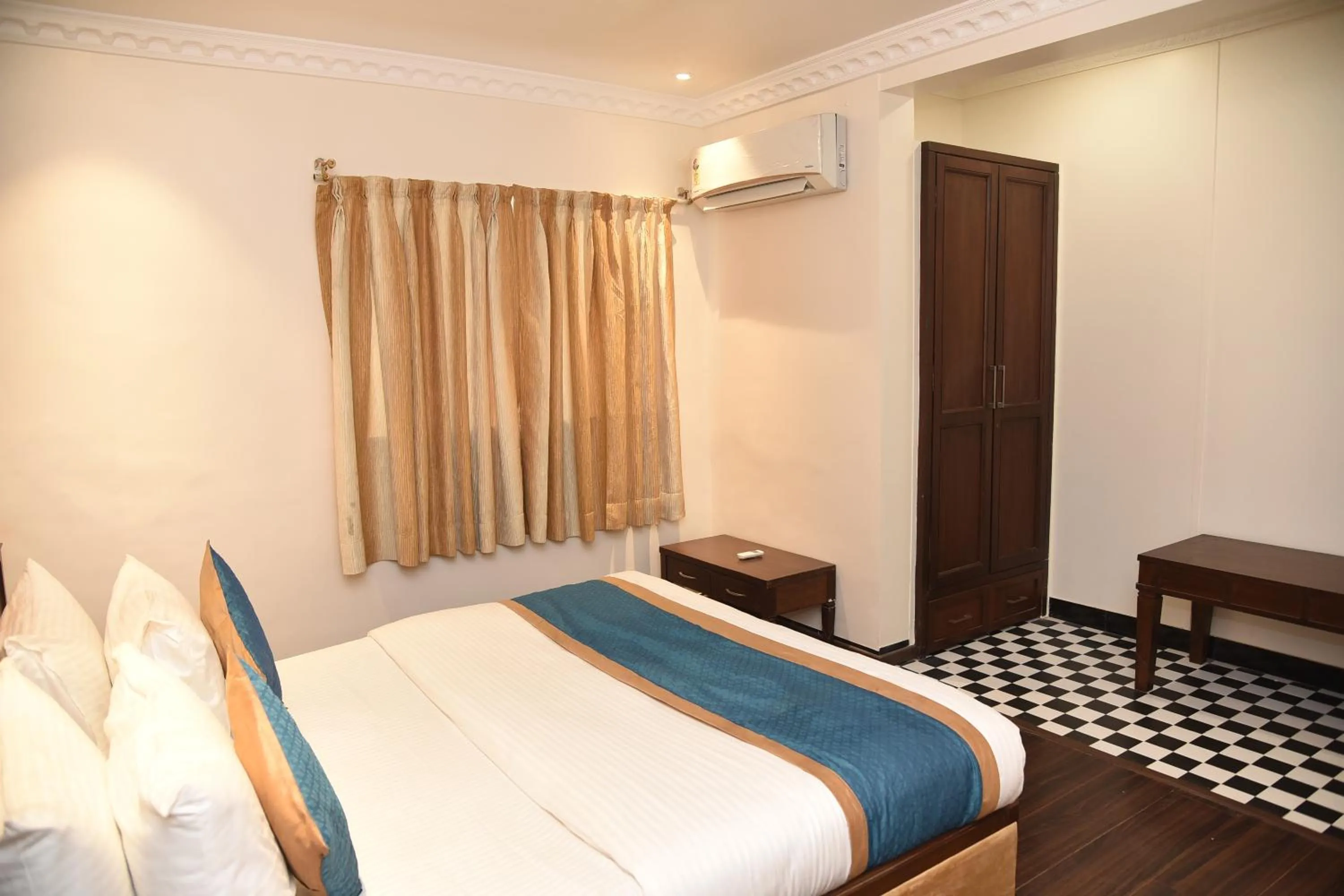 Bed in BelAir Suites Pune