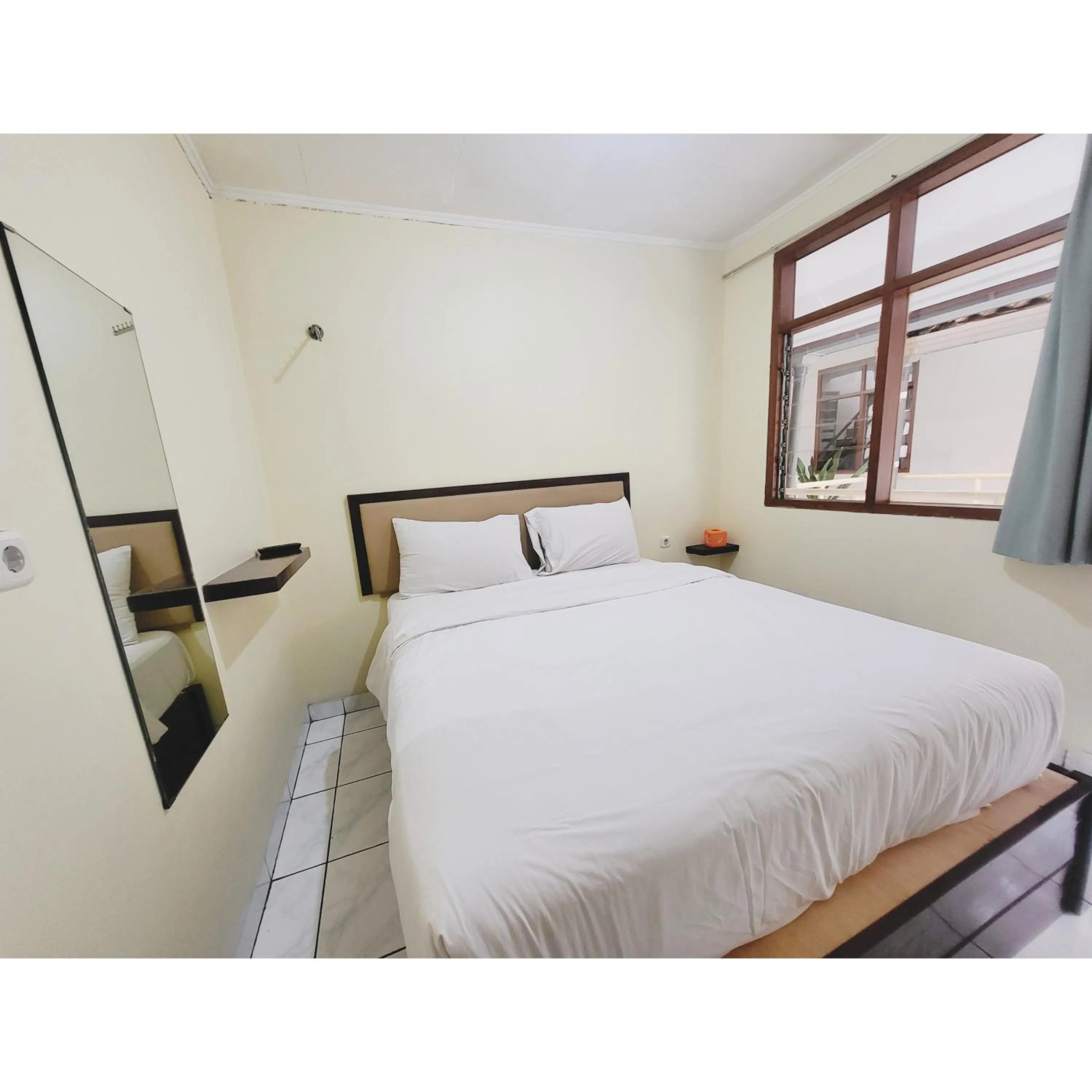 Bed in Bakung Residence