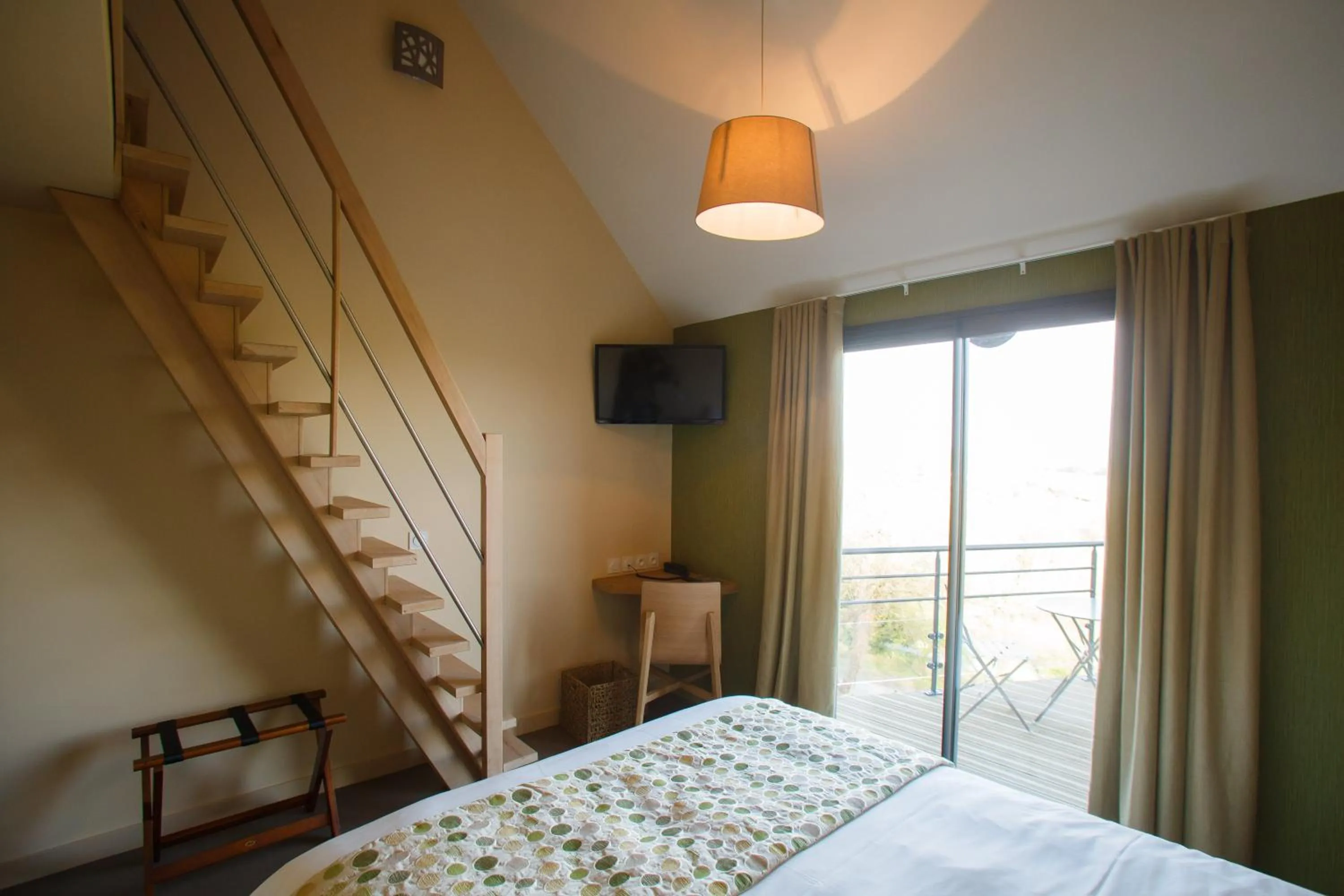 Photo of the whole room, Bed in LOGIS Hôtel-restaurant IMAGO