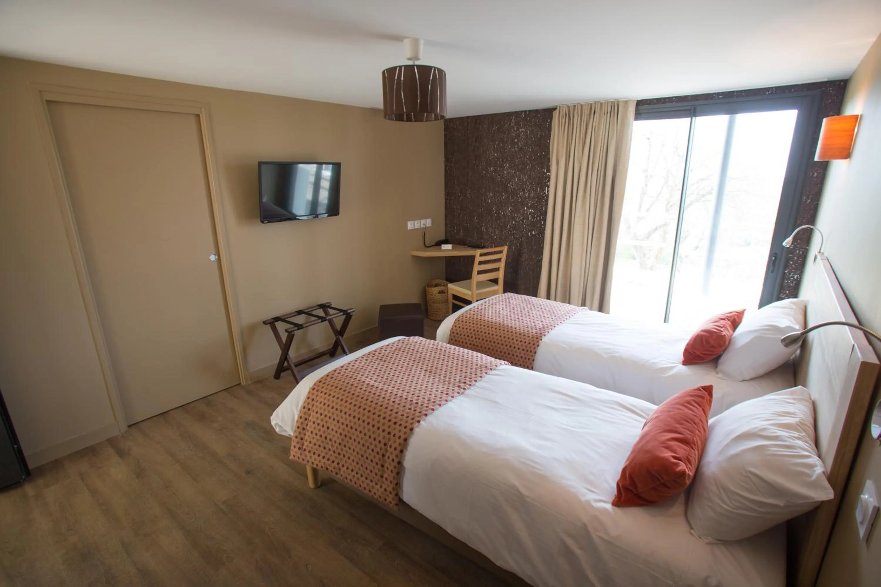 Photo of the whole room, Bed in LOGIS Hôtel-restaurant IMAGO