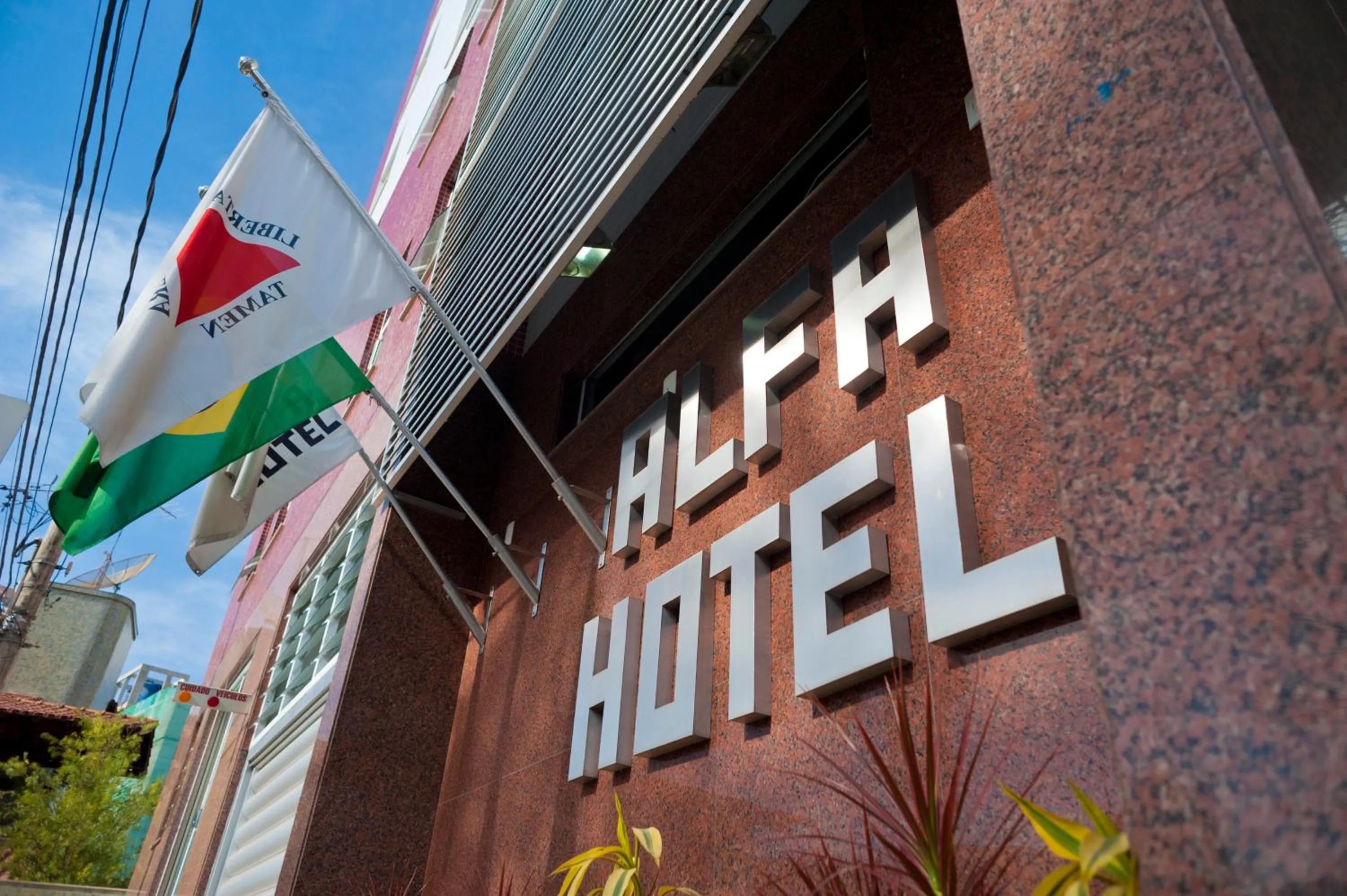 Property logo or sign in Alfa Hotel