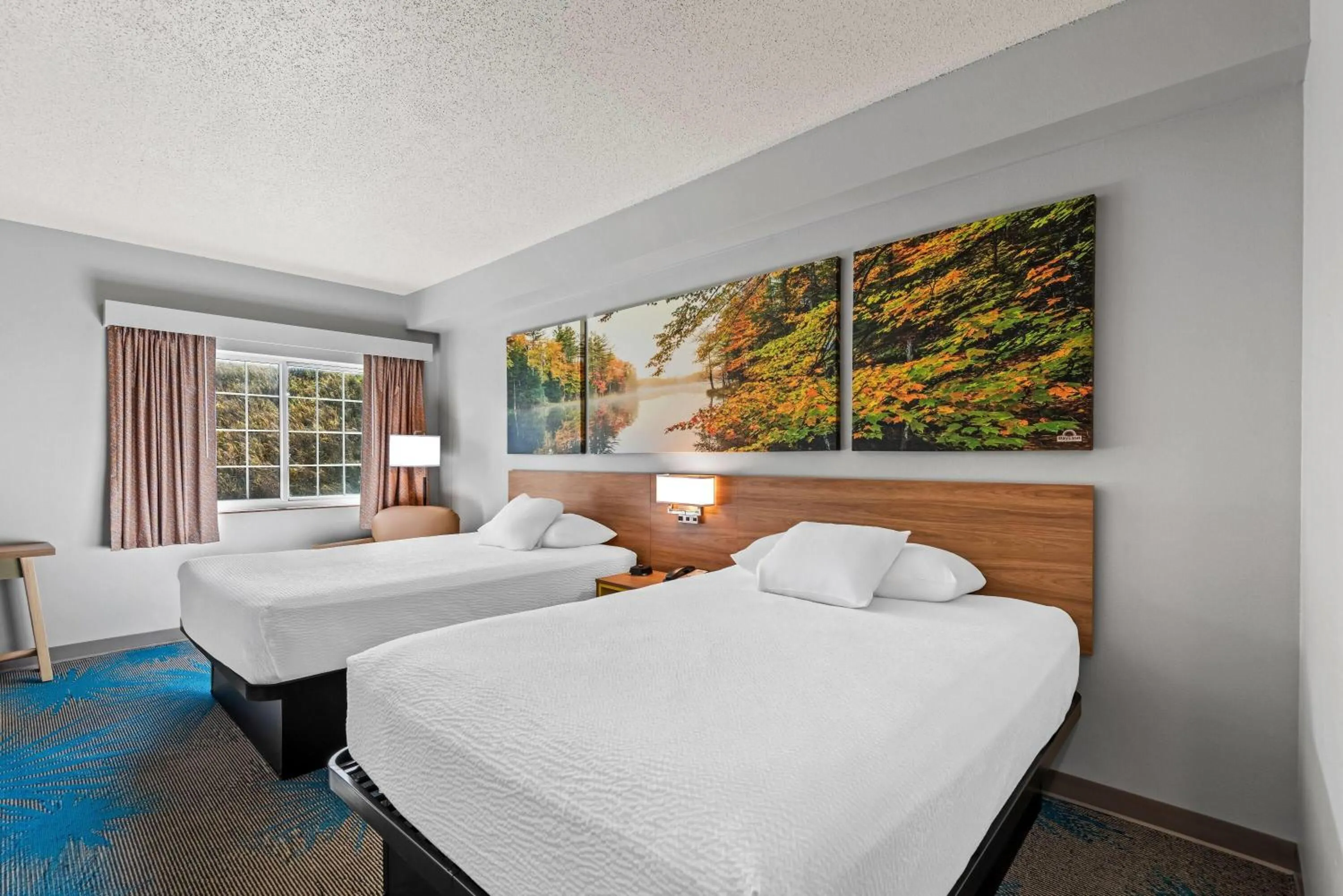 Bed in Days Inn by Wyndham Carroll