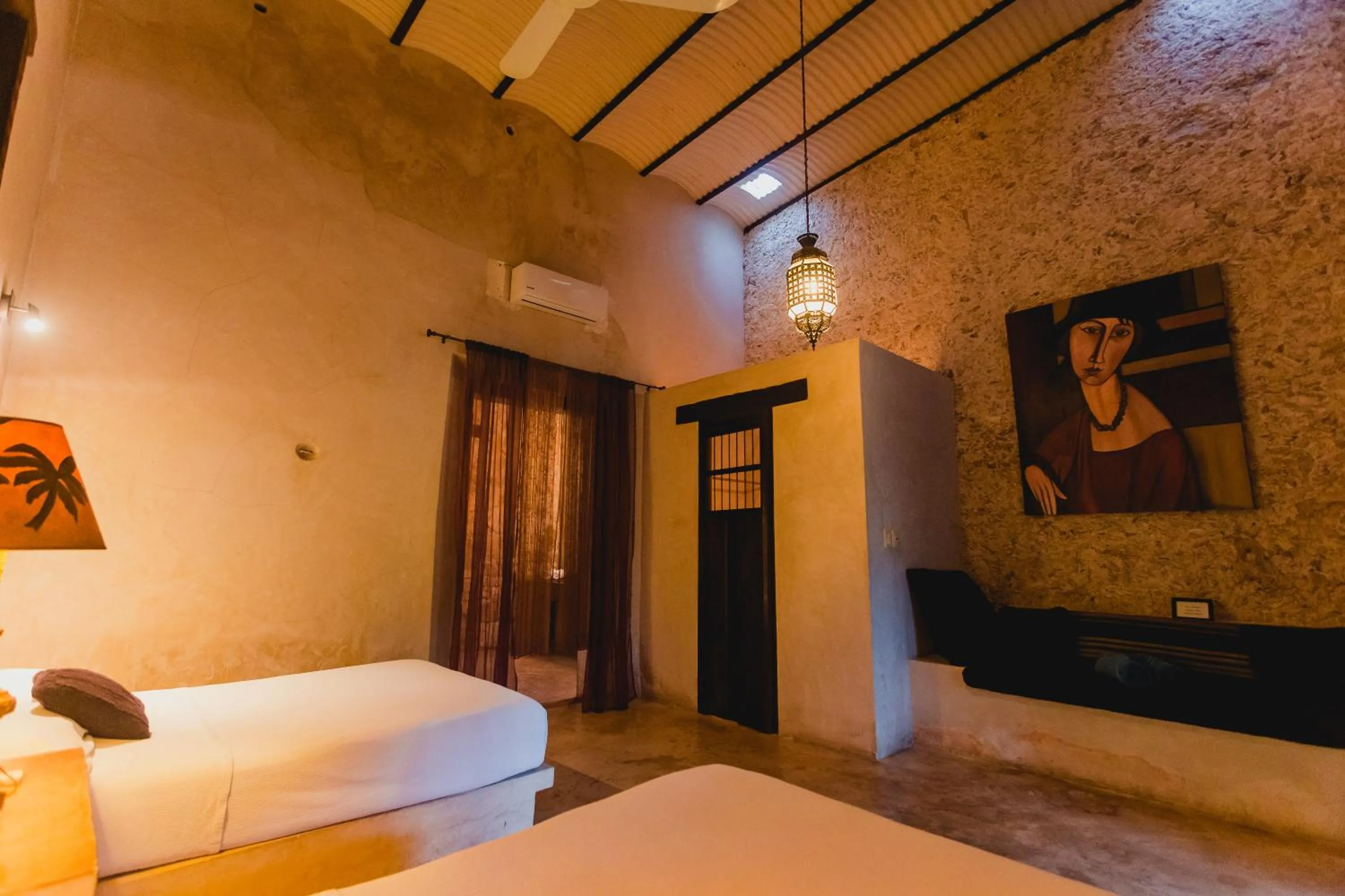 Photo of the whole room, Bed in Hacienda Sacnicte