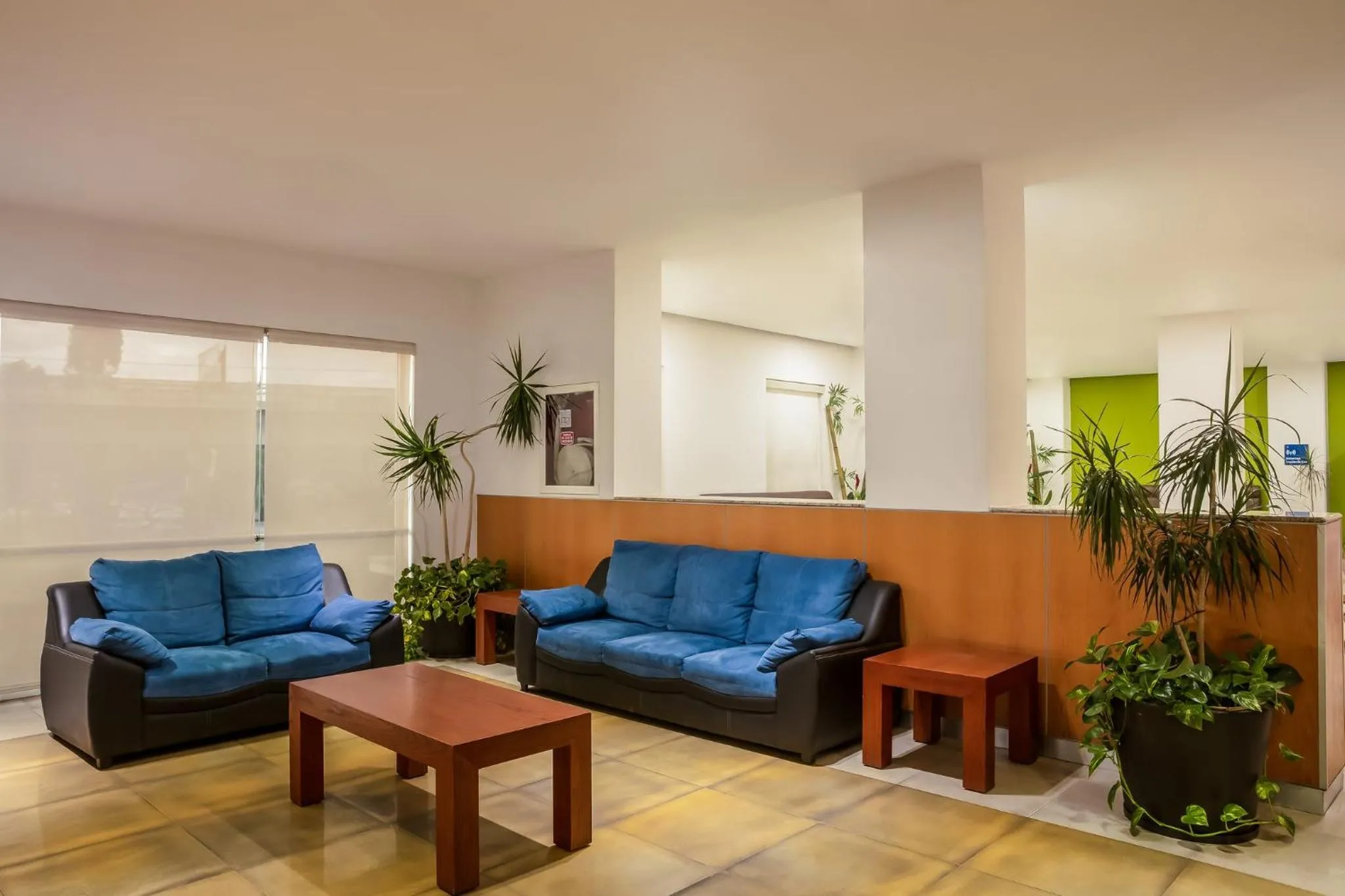 Lobby or reception in One Puebla FINSA