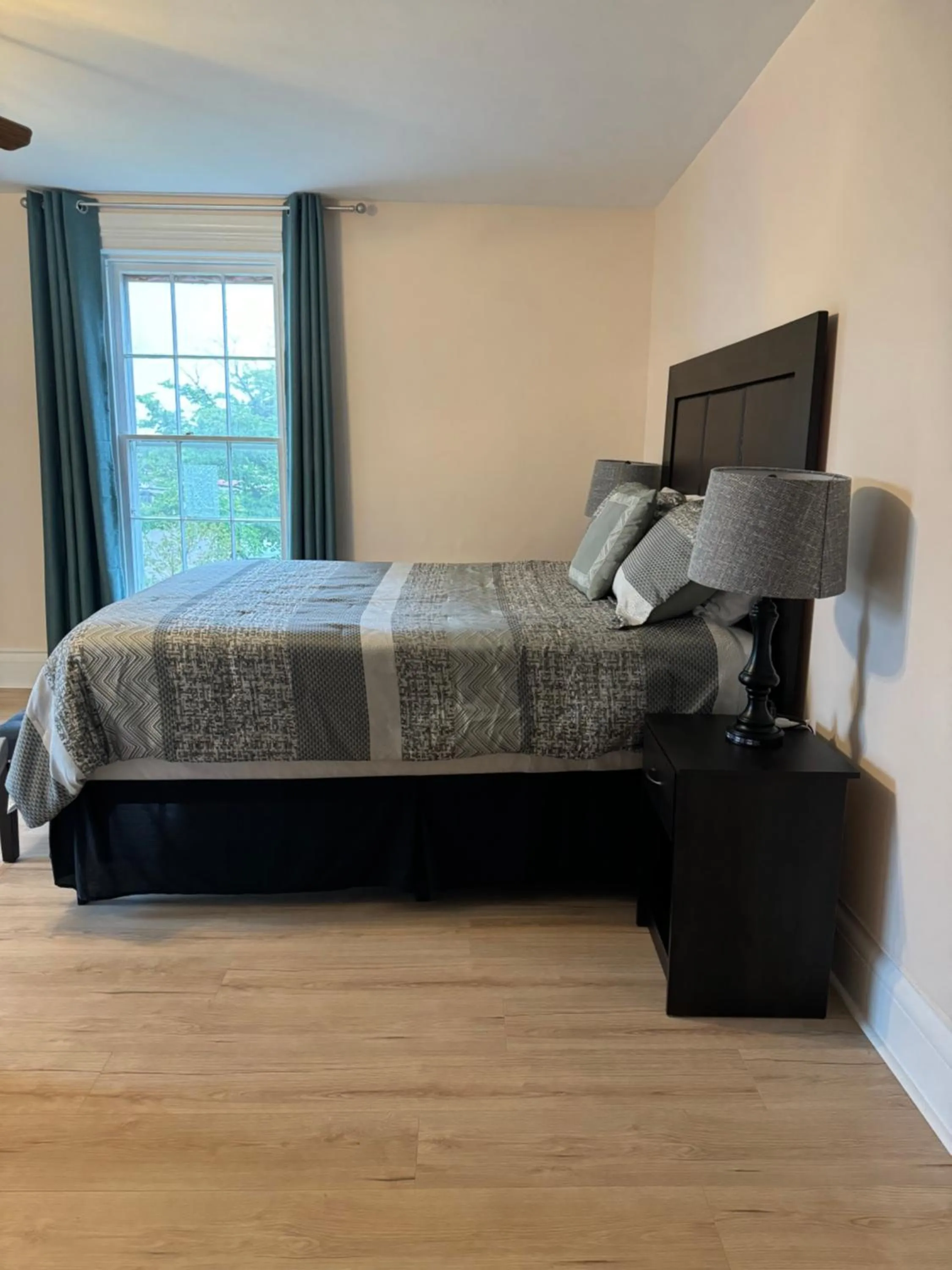 Bed in Sunflower Guest Suites