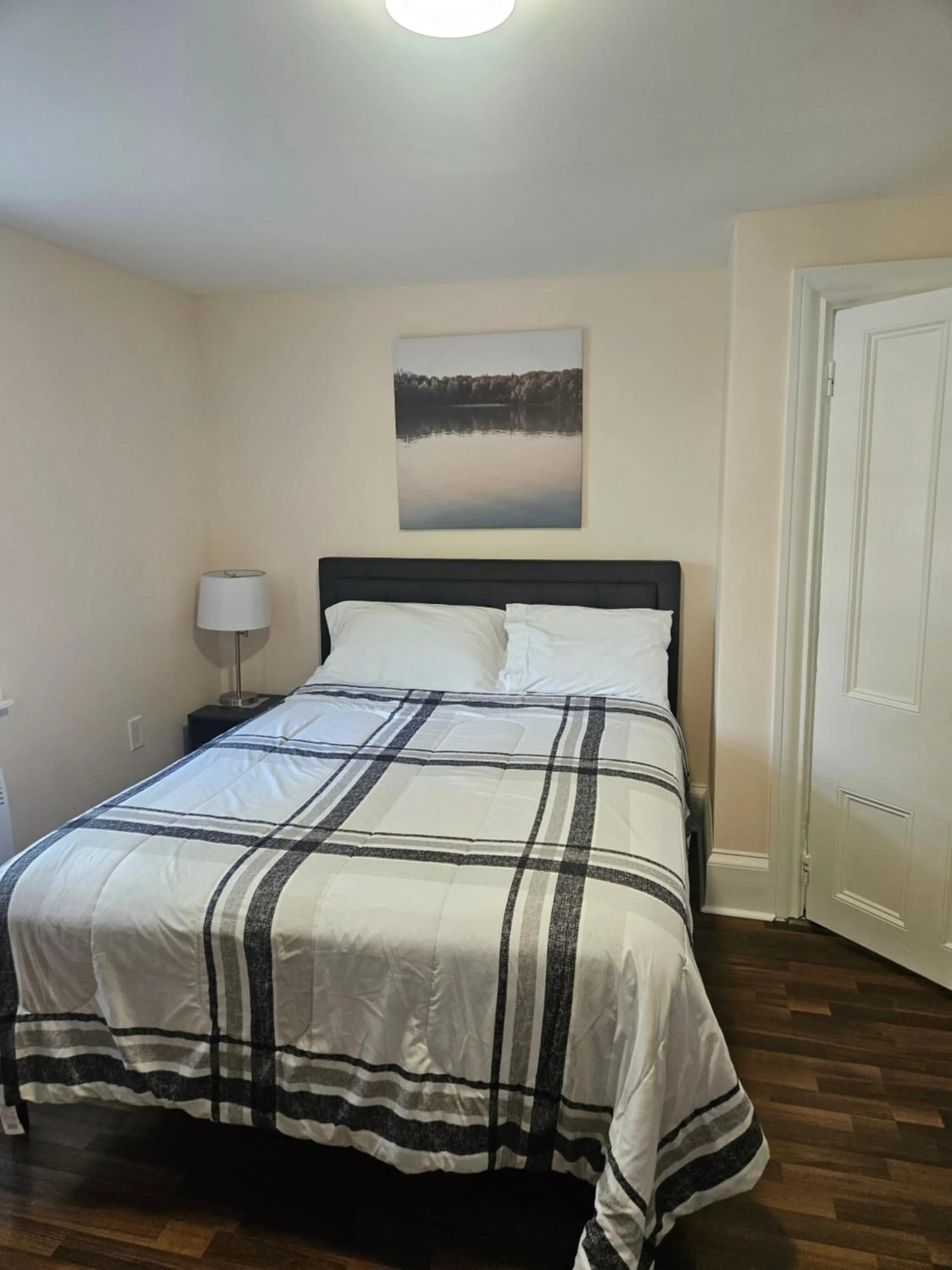 Bed in Sunflower Guest Suites