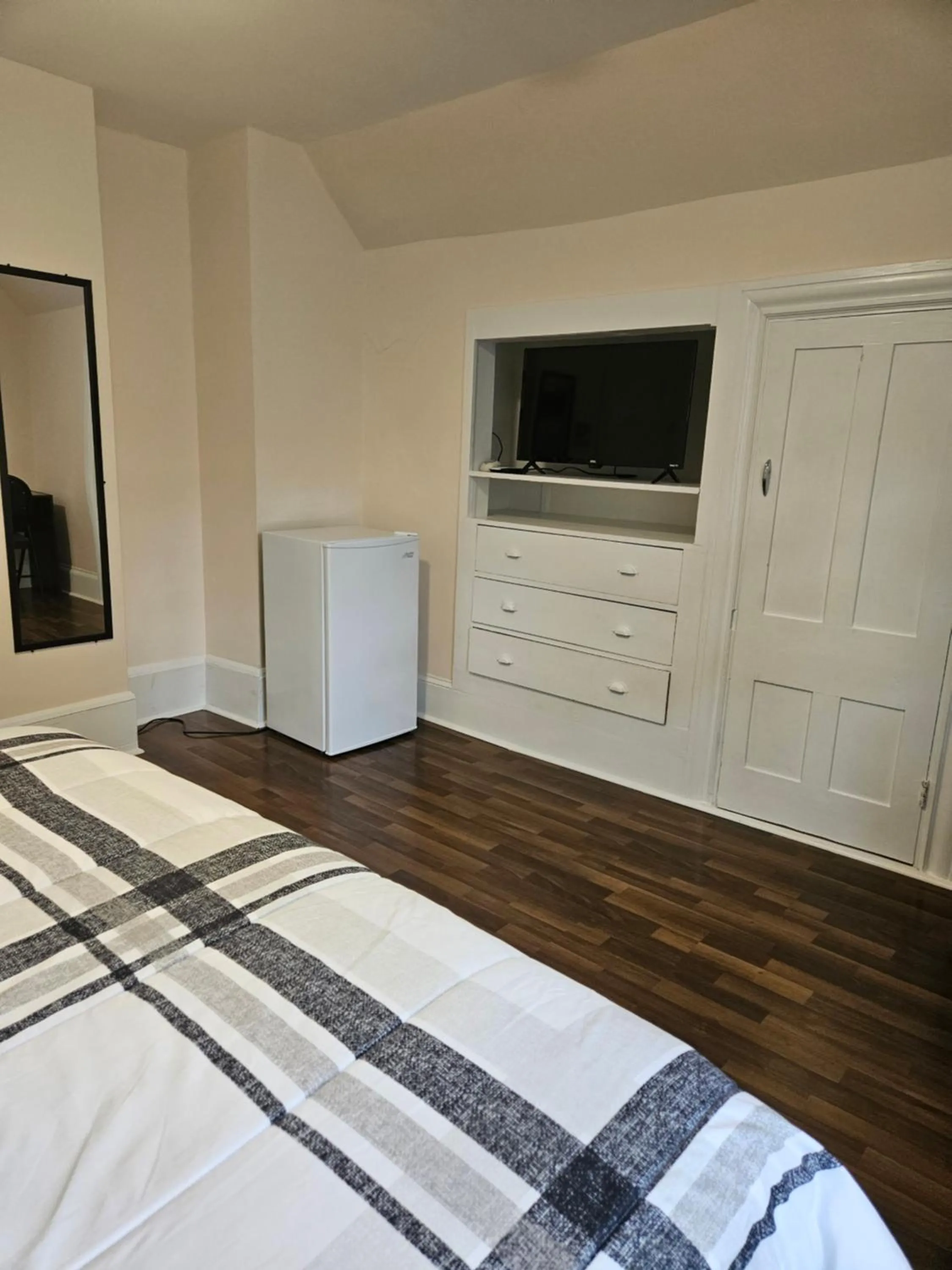 Bed in Sunflower Guest Suites