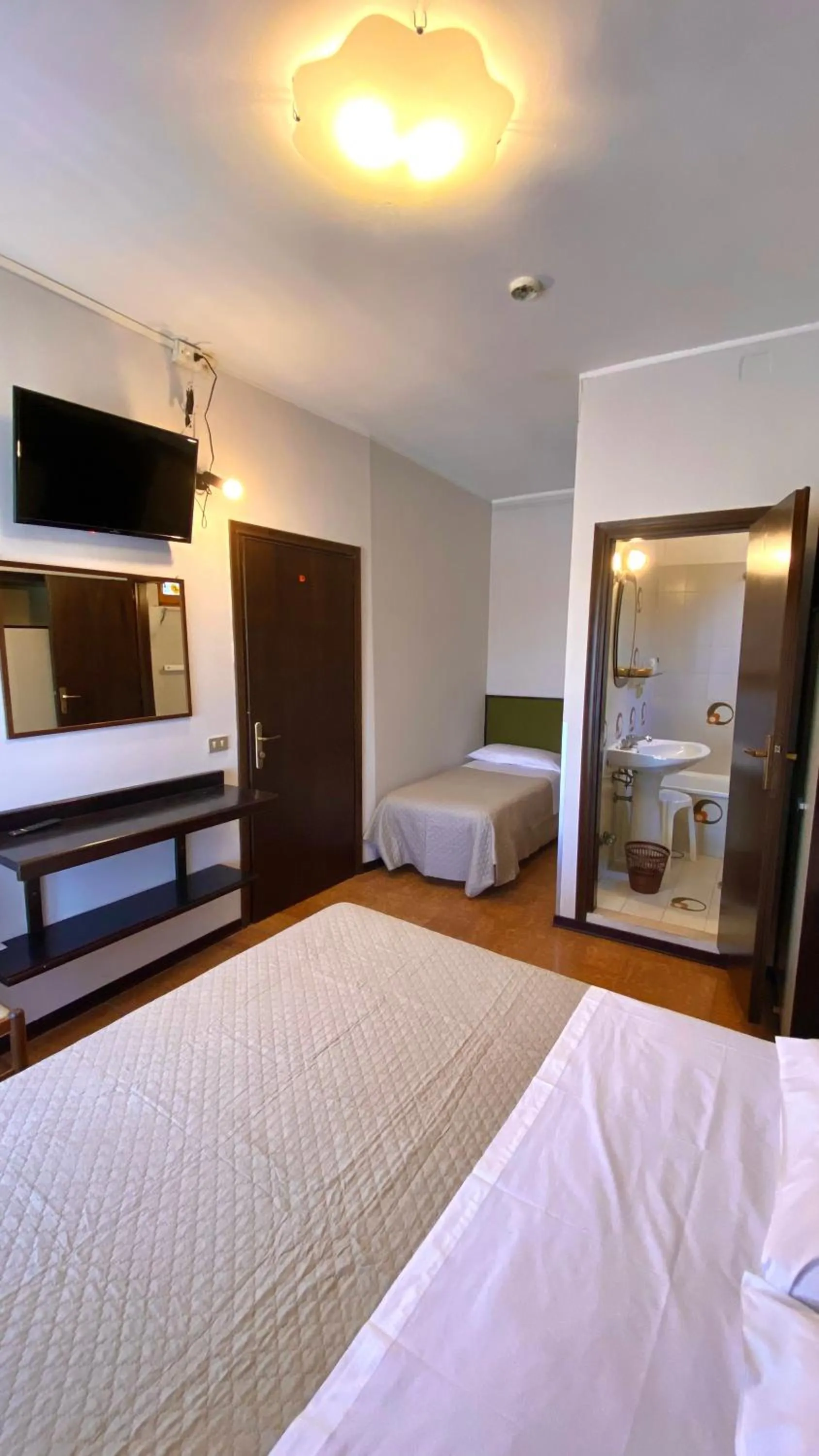 Bed in Umbria Green Central Rooms