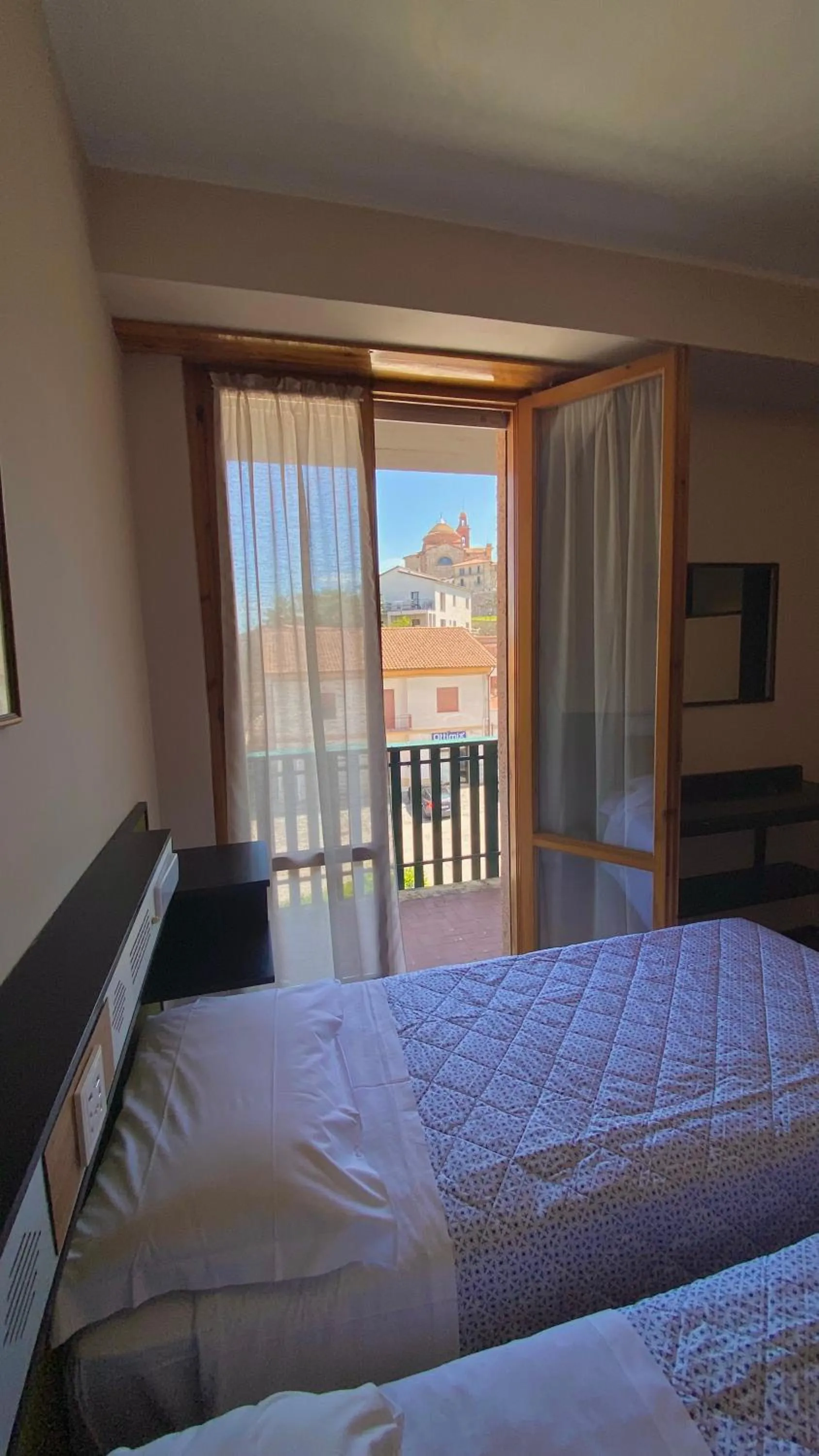 Bed in Umbria Green Central Rooms