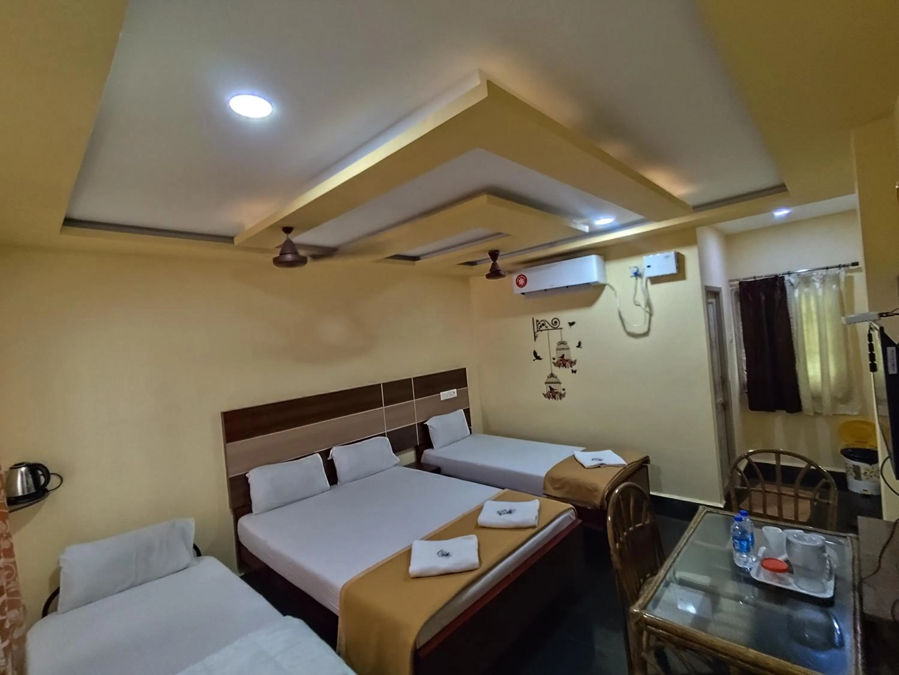 Bed in Sri Murugan Beach Paradise Hotel