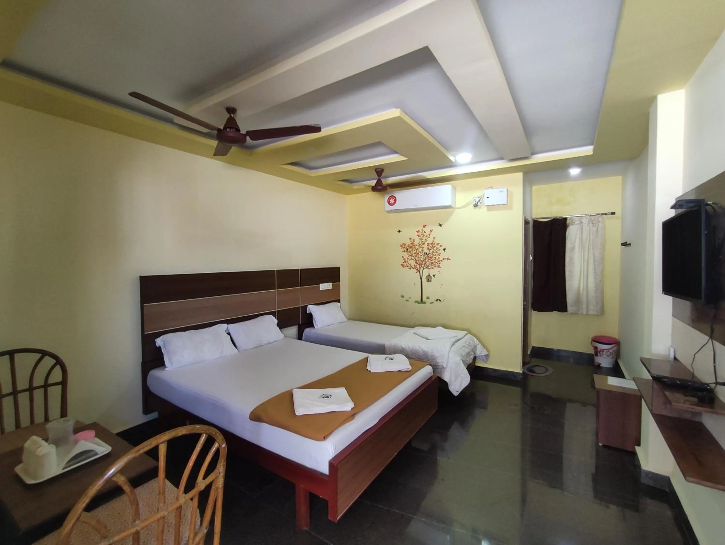 Bed in Sri Murugan Beach Paradise Hotel