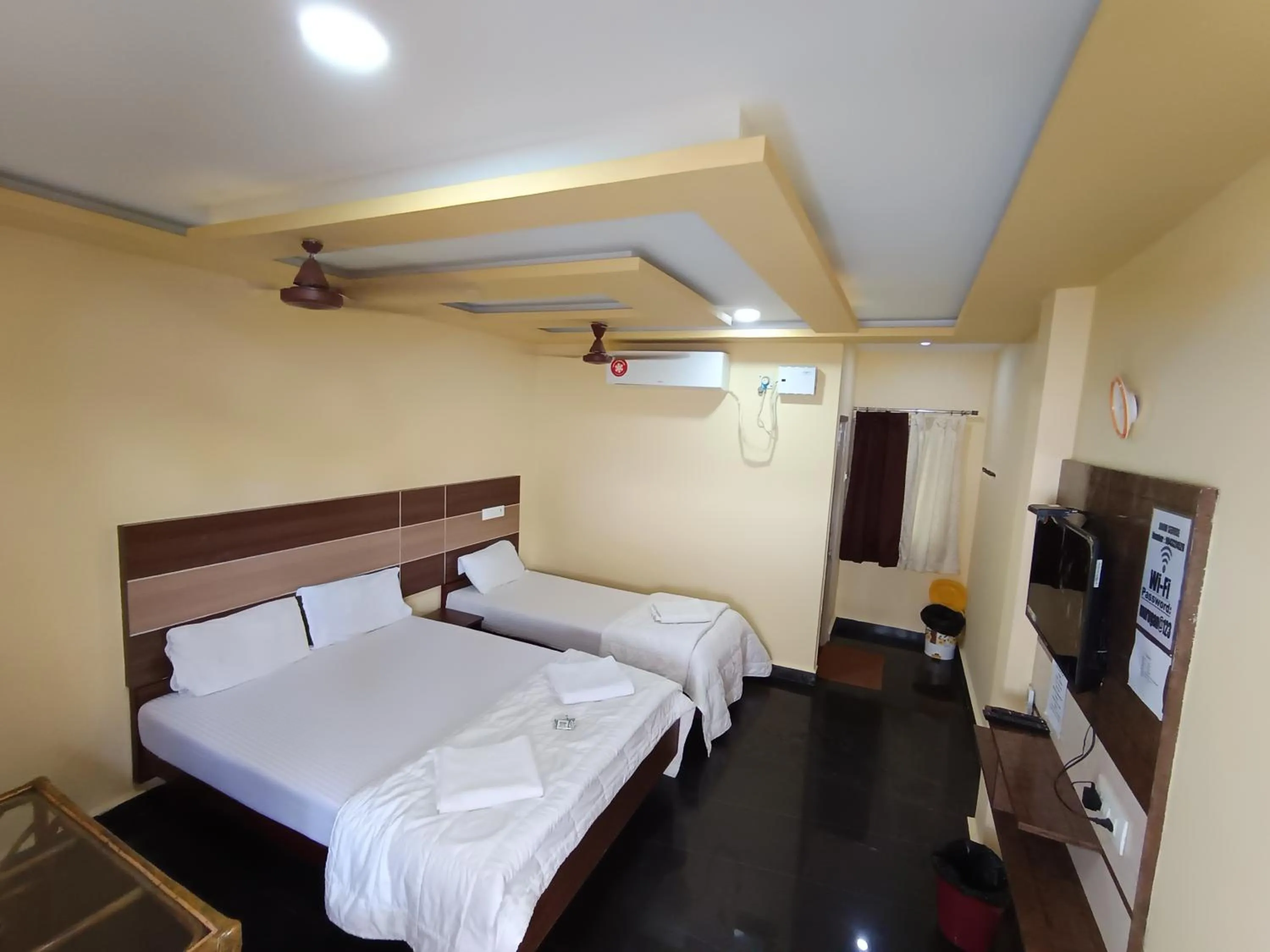 Bed in Sri Murugan Beach Paradise Hotel