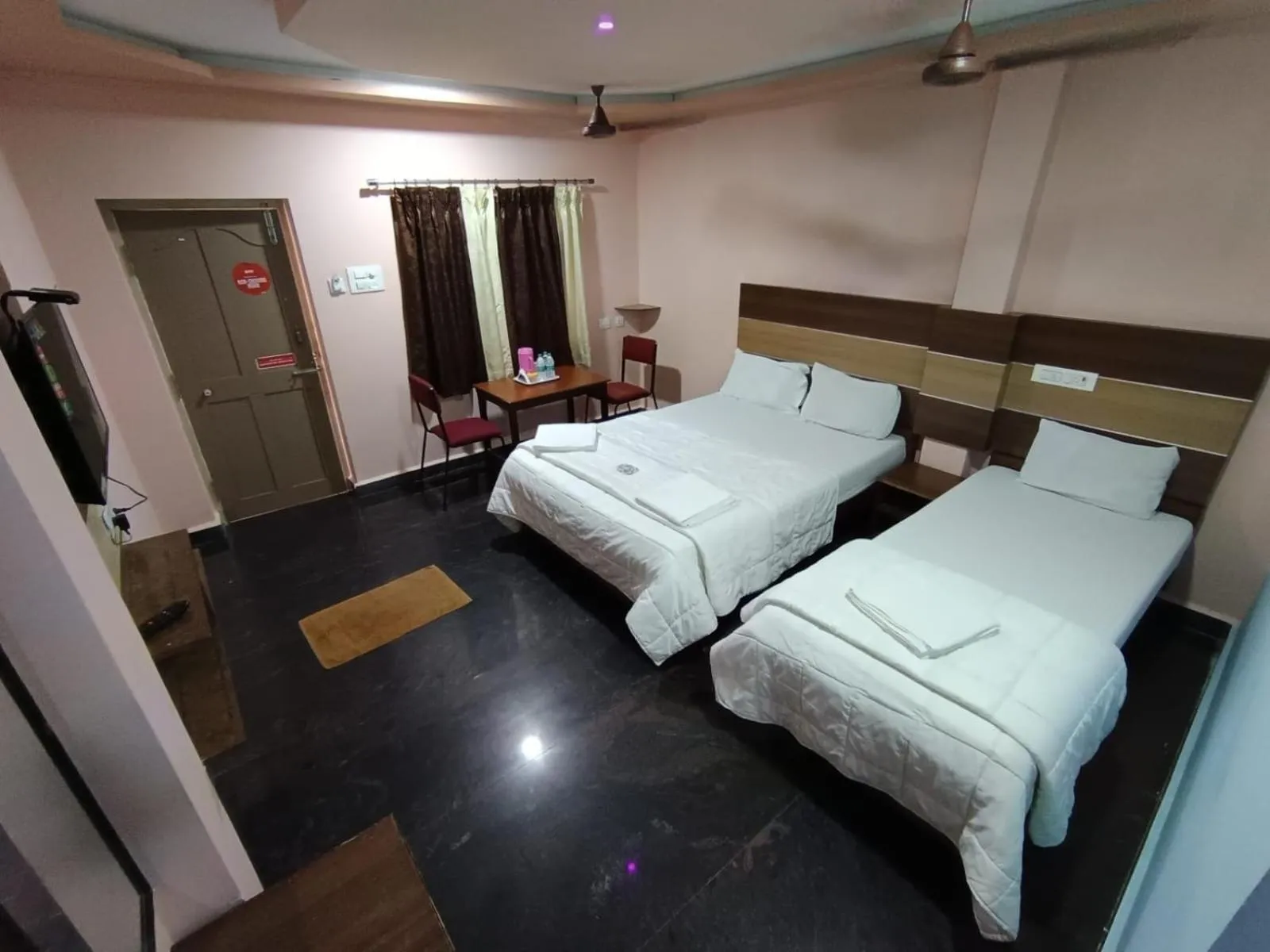 Bed in Sri Murugan Beach Paradise Hotel