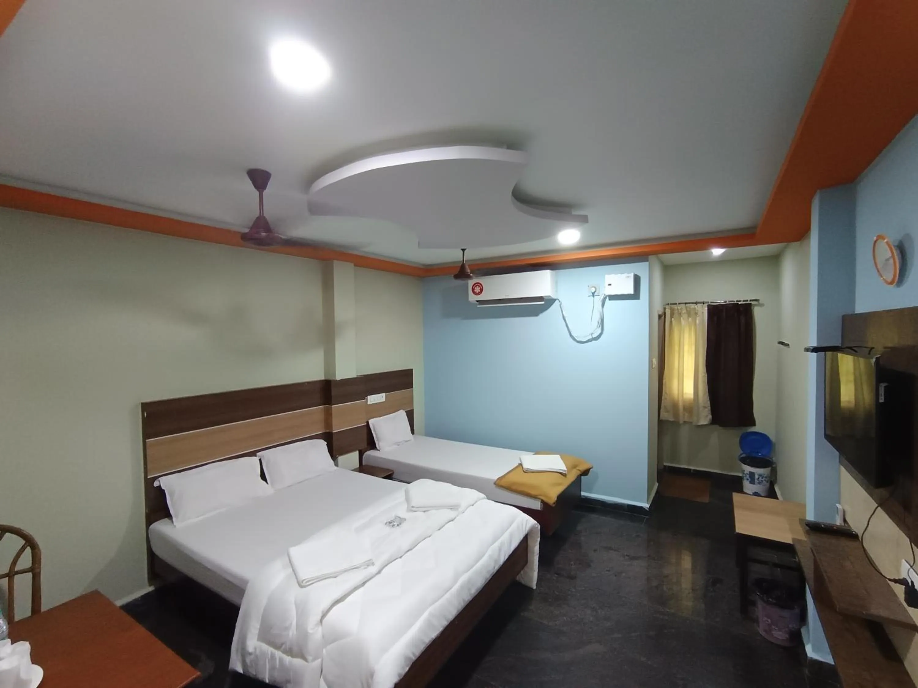 Bed in Sri Murugan Beach Paradise Hotel