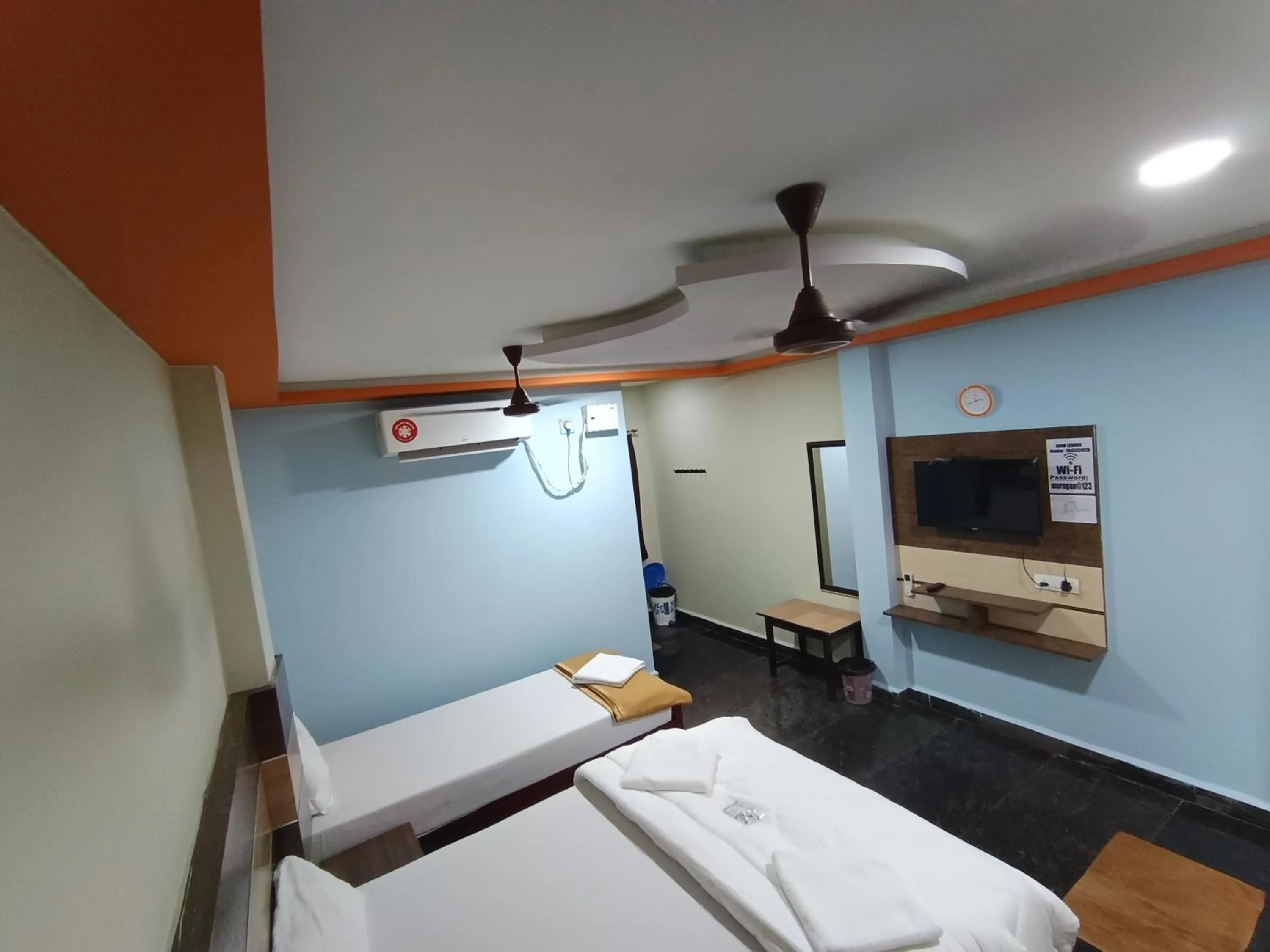 Bed in Sri Murugan Beach Paradise Hotel
